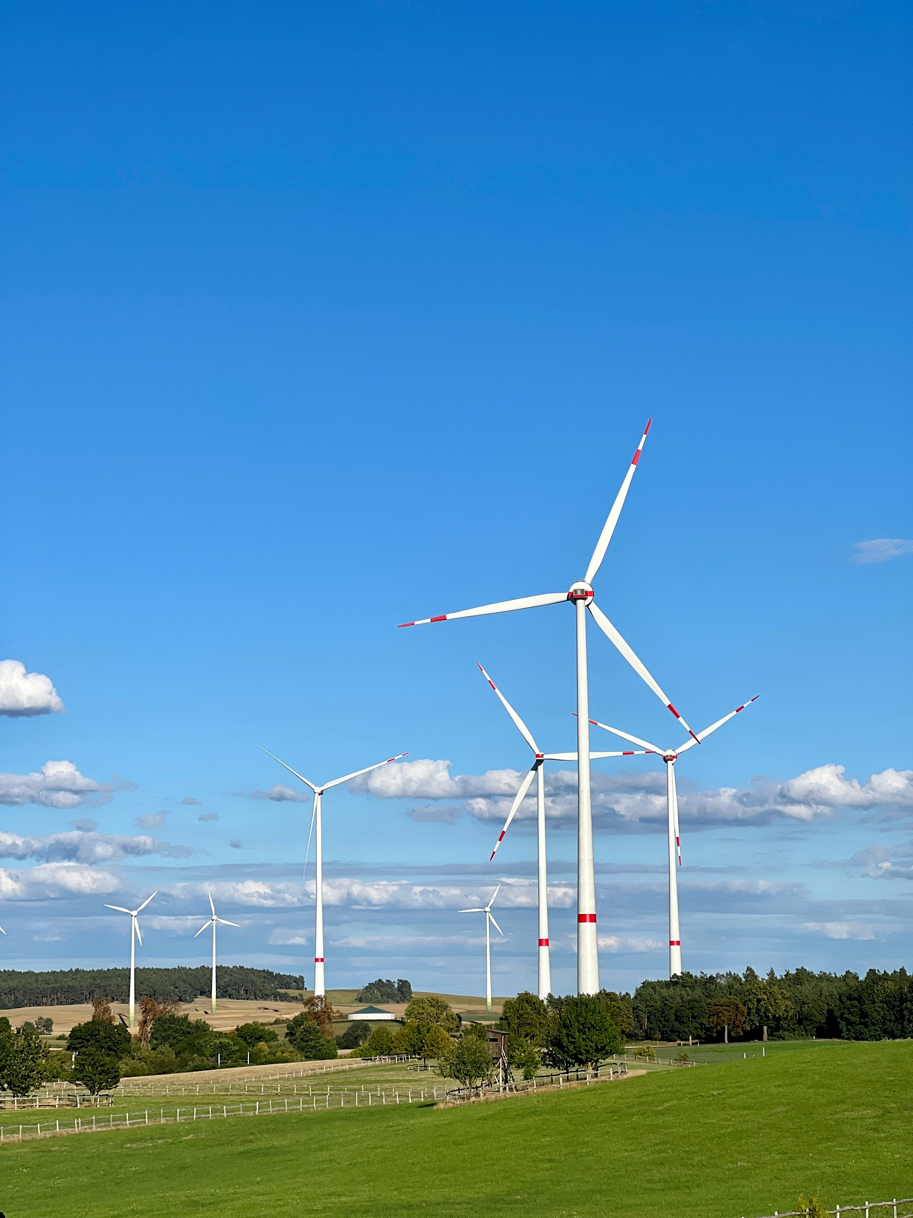 a group of wind turbines