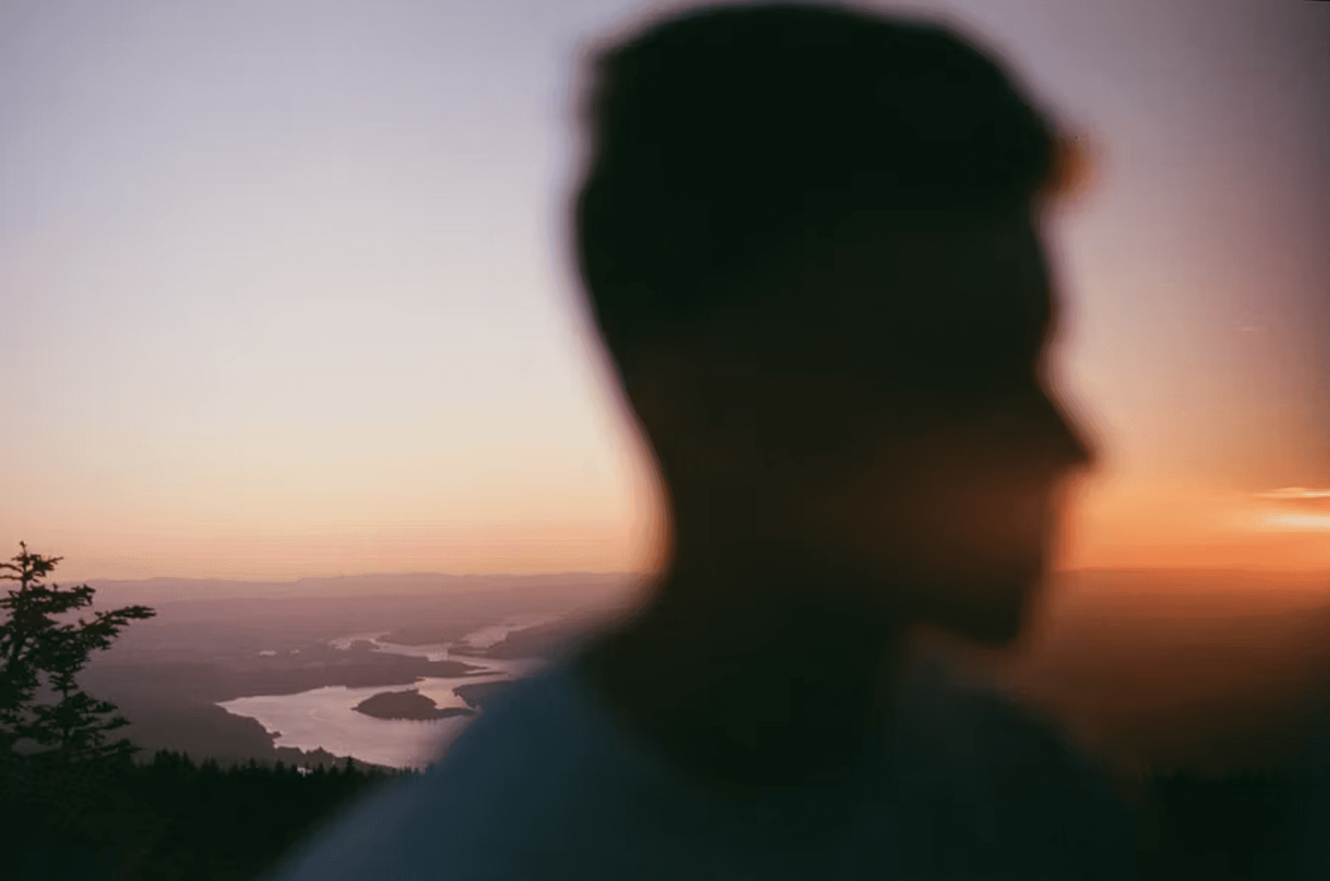 Person silhouetted against a sunset landscape, representing safe LinkedIn outreach automation in 2026