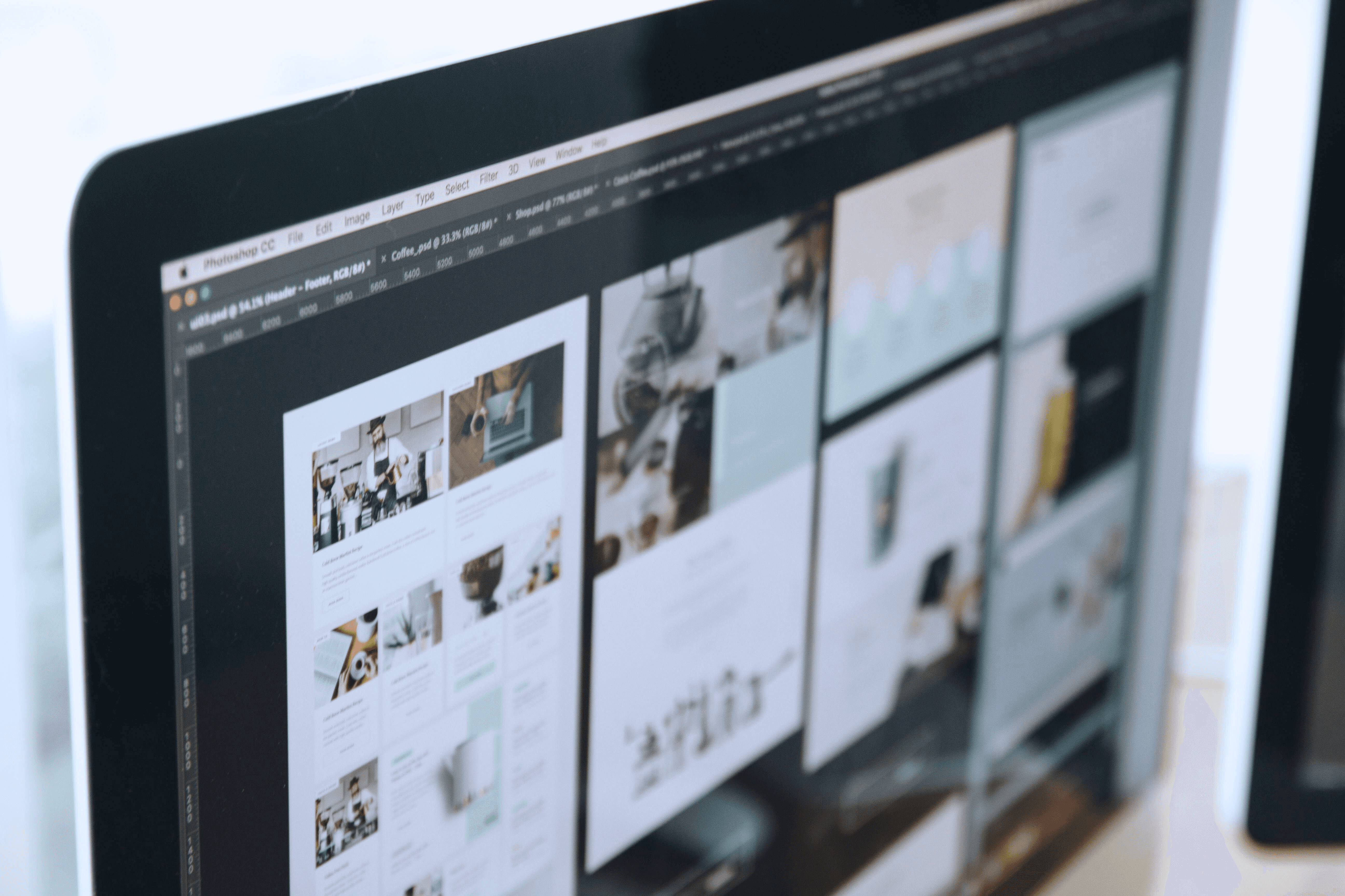 Website design screen on desktop computer