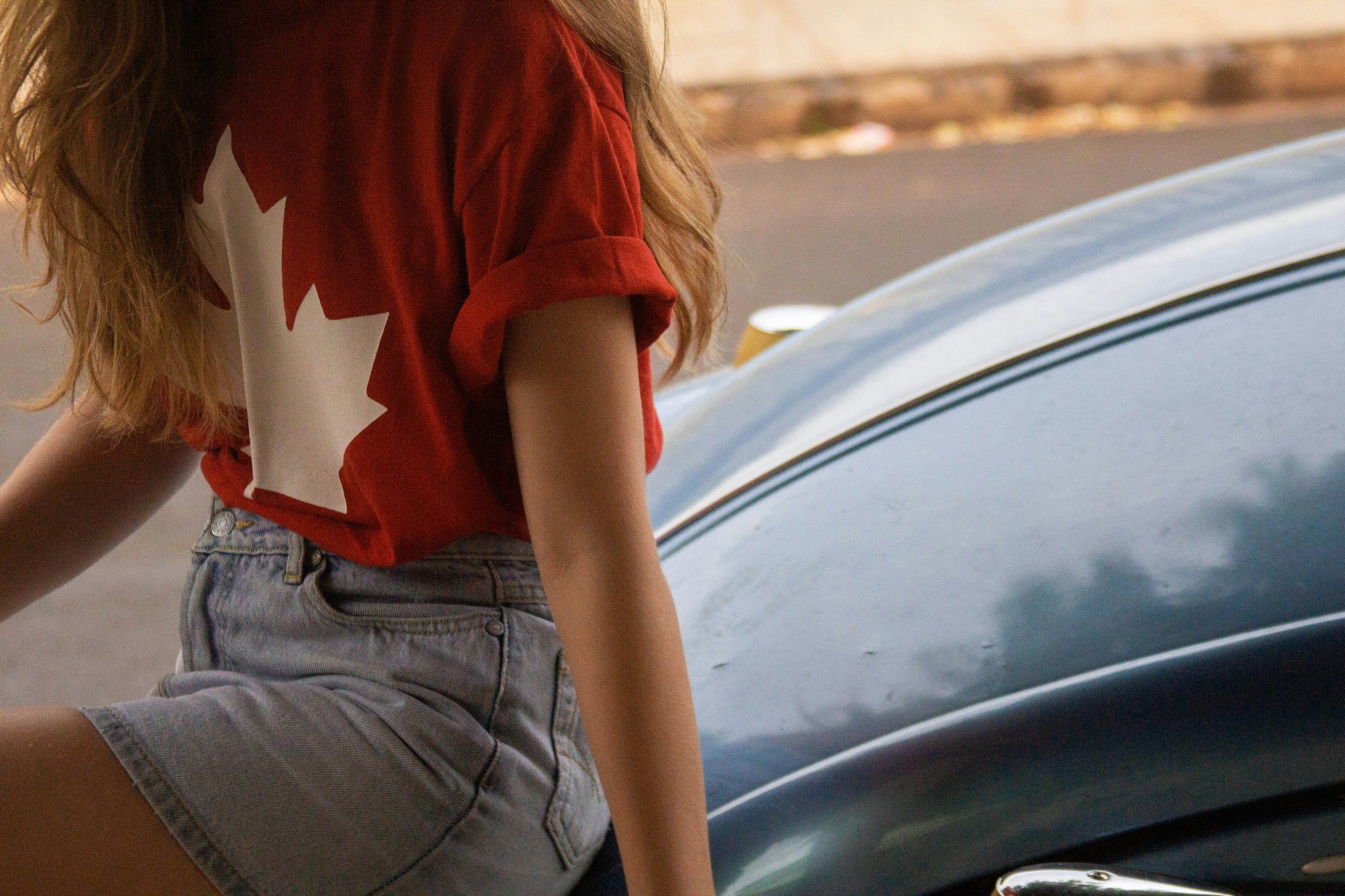 woman sitting on car - Preppy Girl Aesthetic