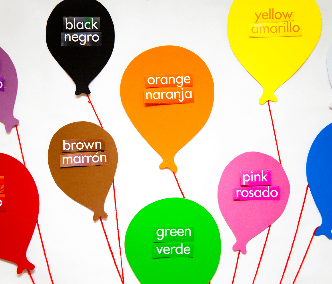 two women talking while looking at laptop computer