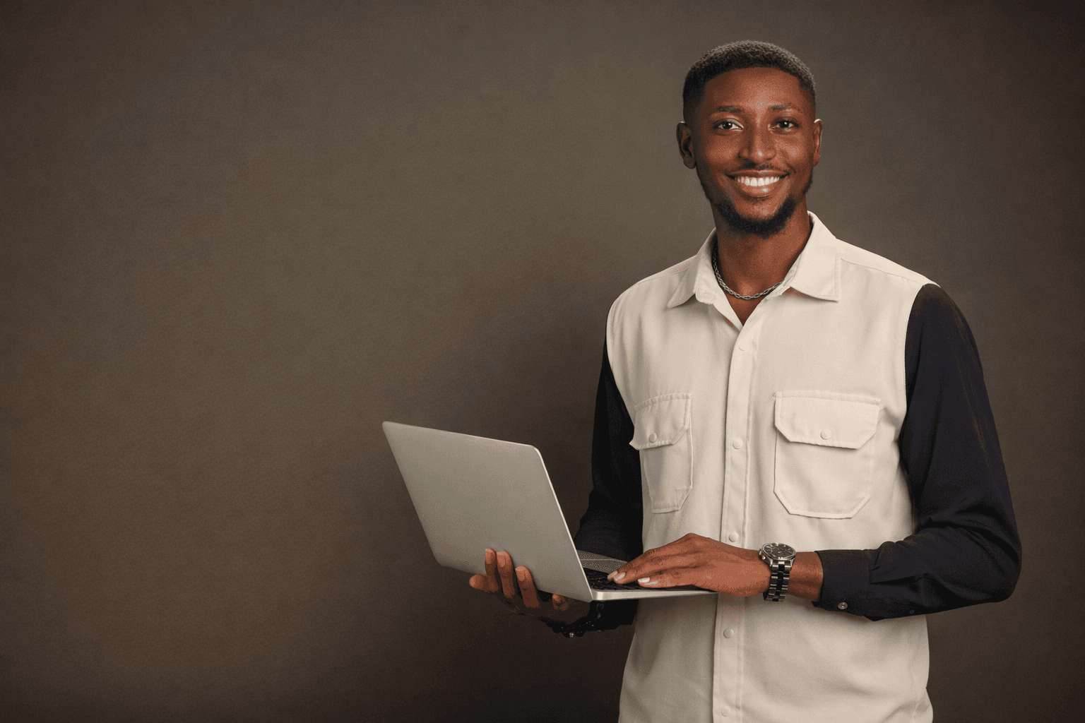 woman in blue tank top standing beside white wall