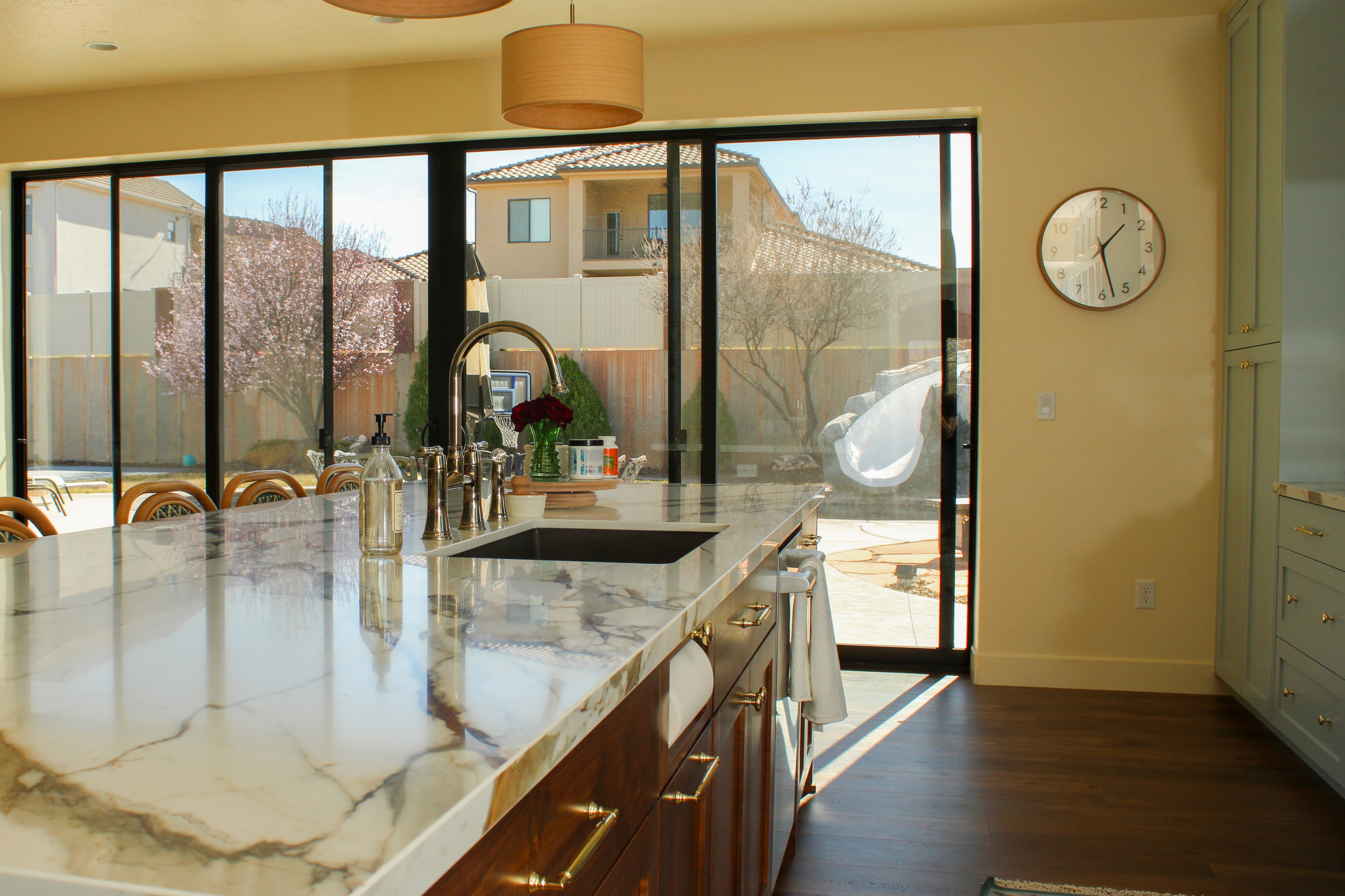 View from the kitchen toward the backyard in a Washington, Utah home remodel with indoor-outdoor flow