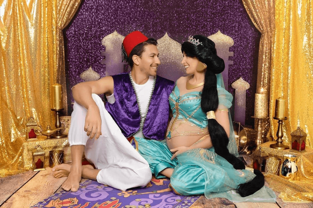 Couple photoshoot in Dubai wearing Alladin costumes, featured in a photoshoot session at Mahvin Photography studio.