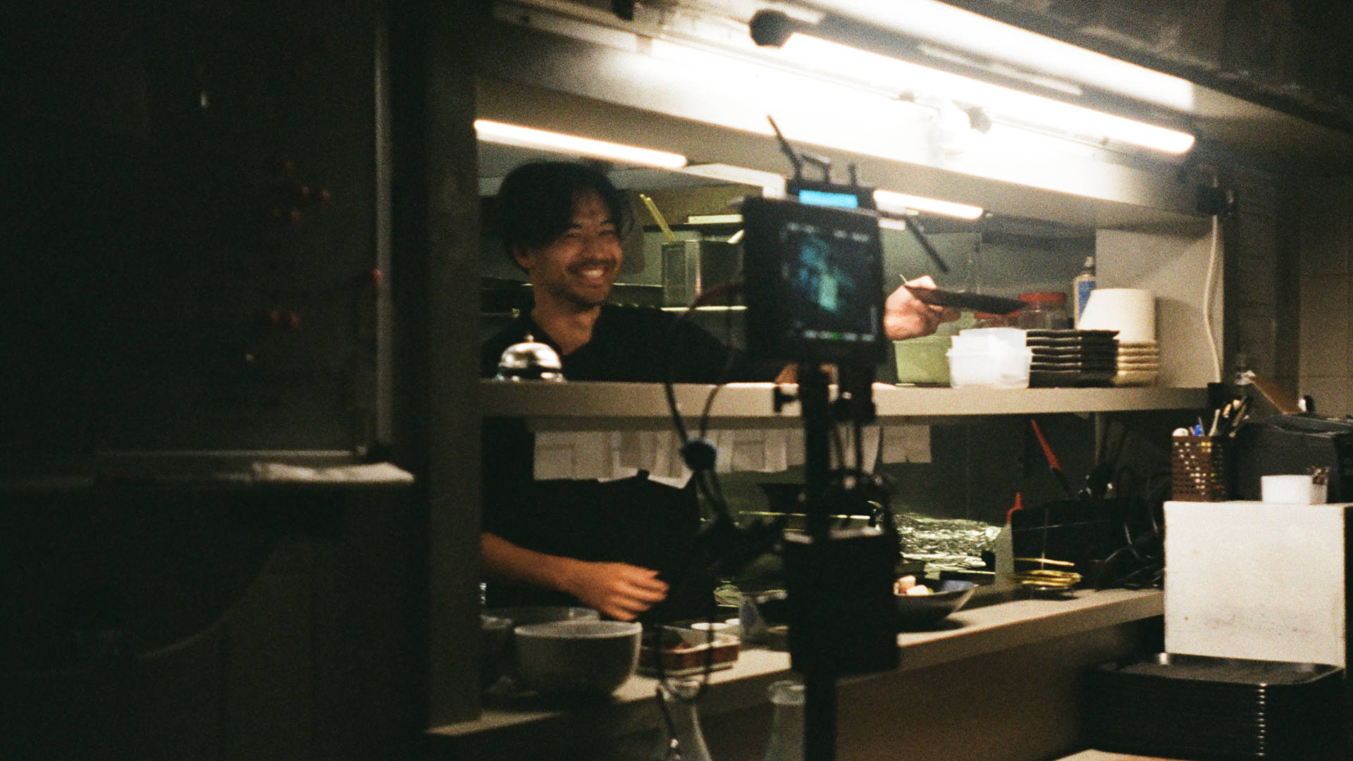 Musashi Wakaki in the kitchen preparing the props for Last Order short film