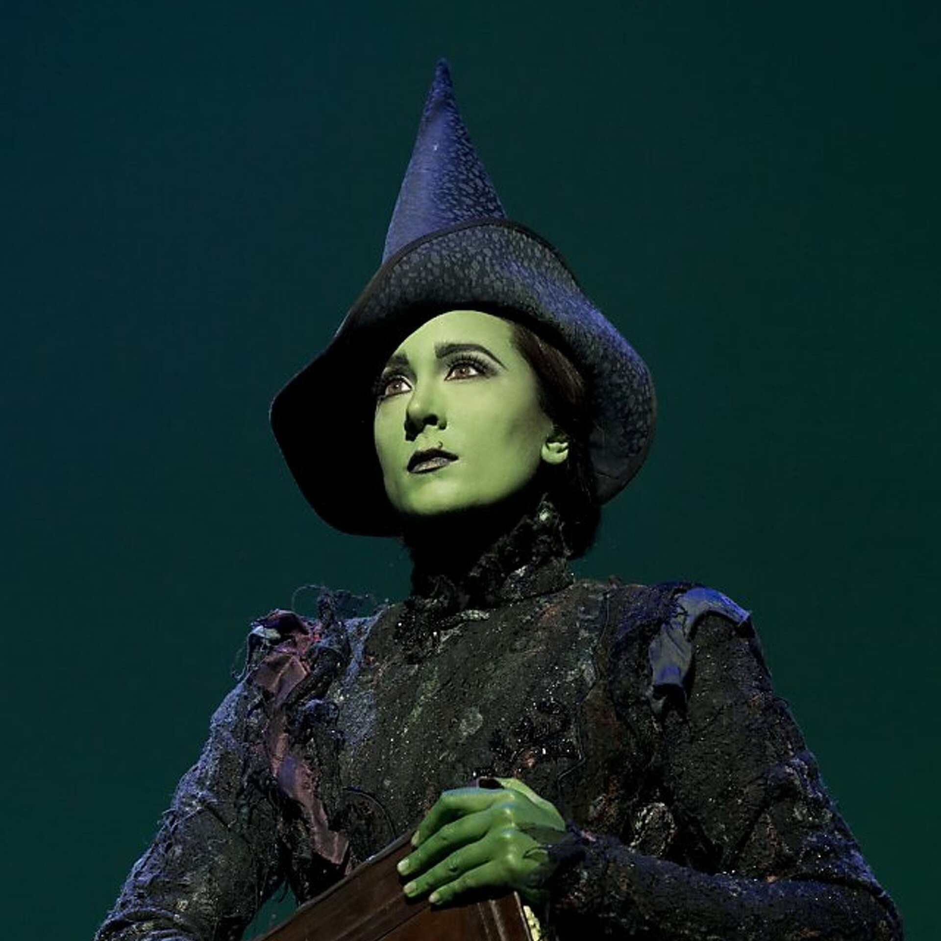 Dee Roscioli as Elphaba
