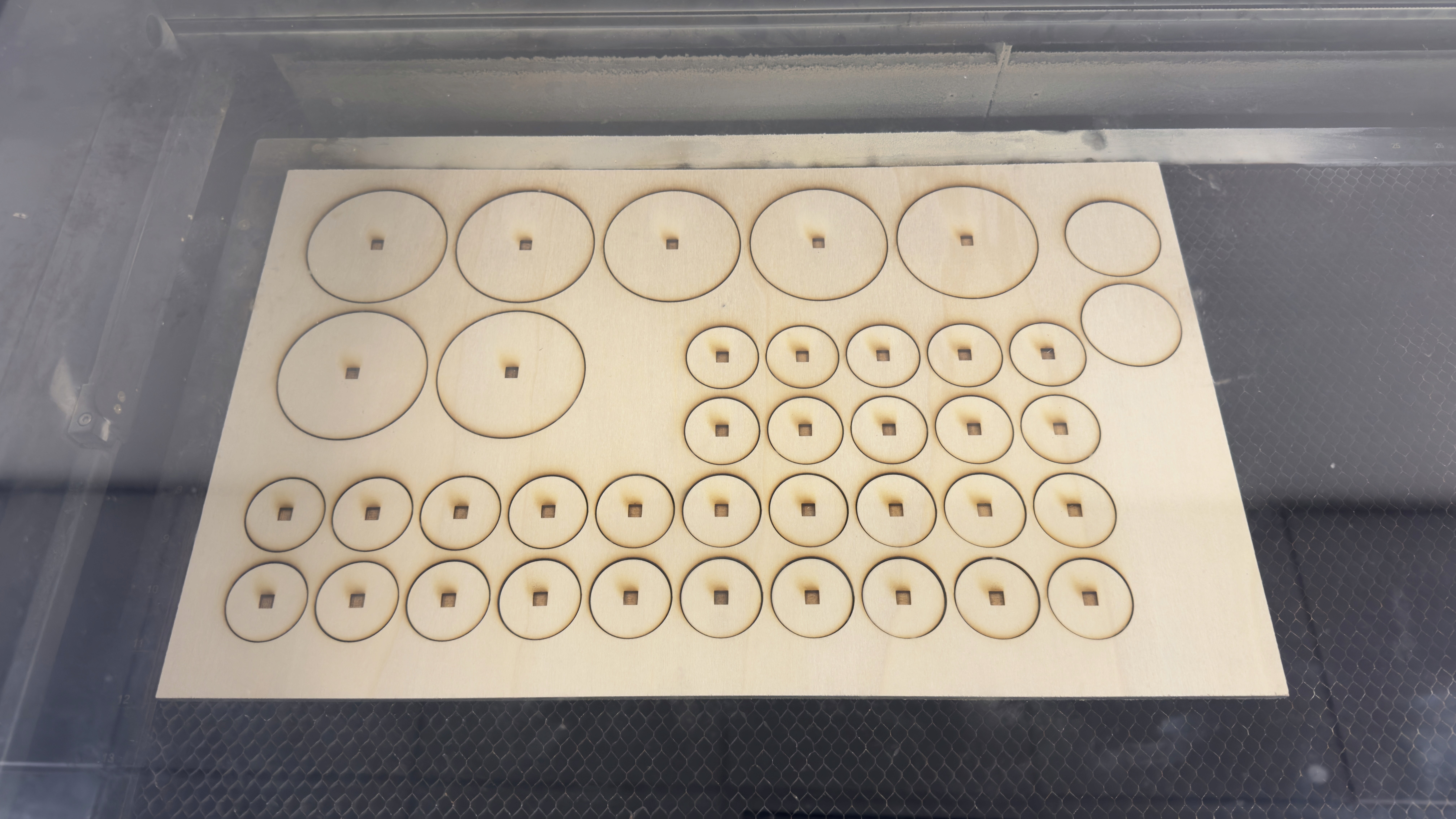 Laser cutting the circles for all my nodes.