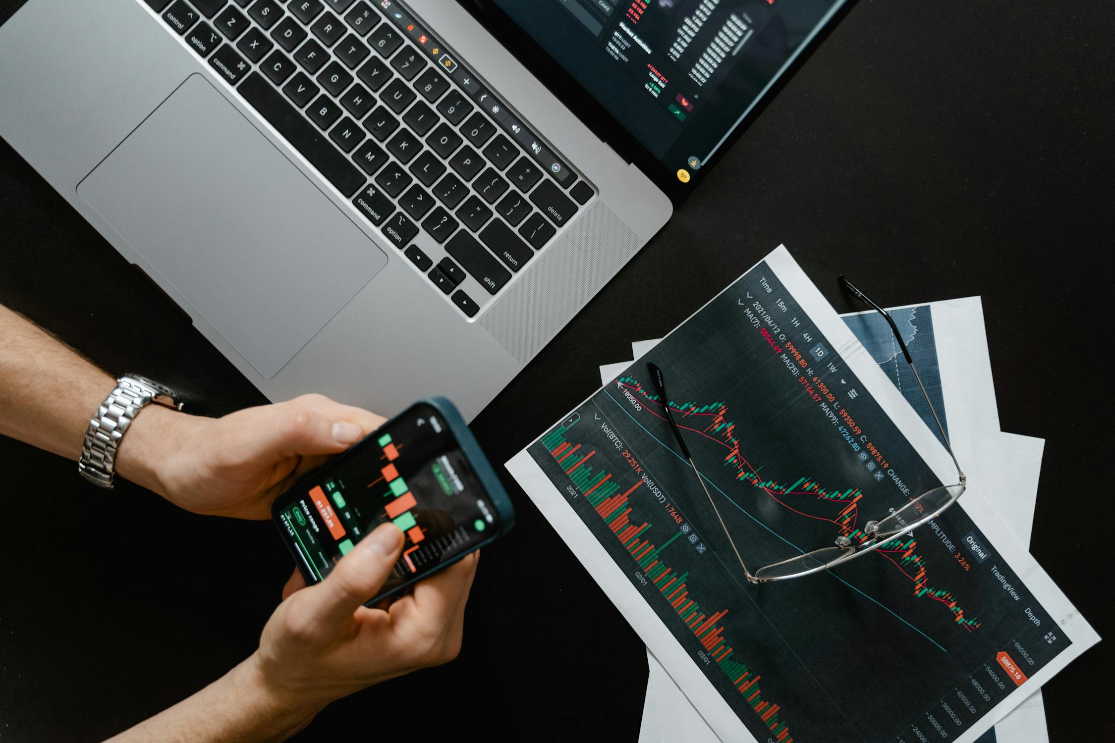 Business professional analyzing data on laptop computer screen