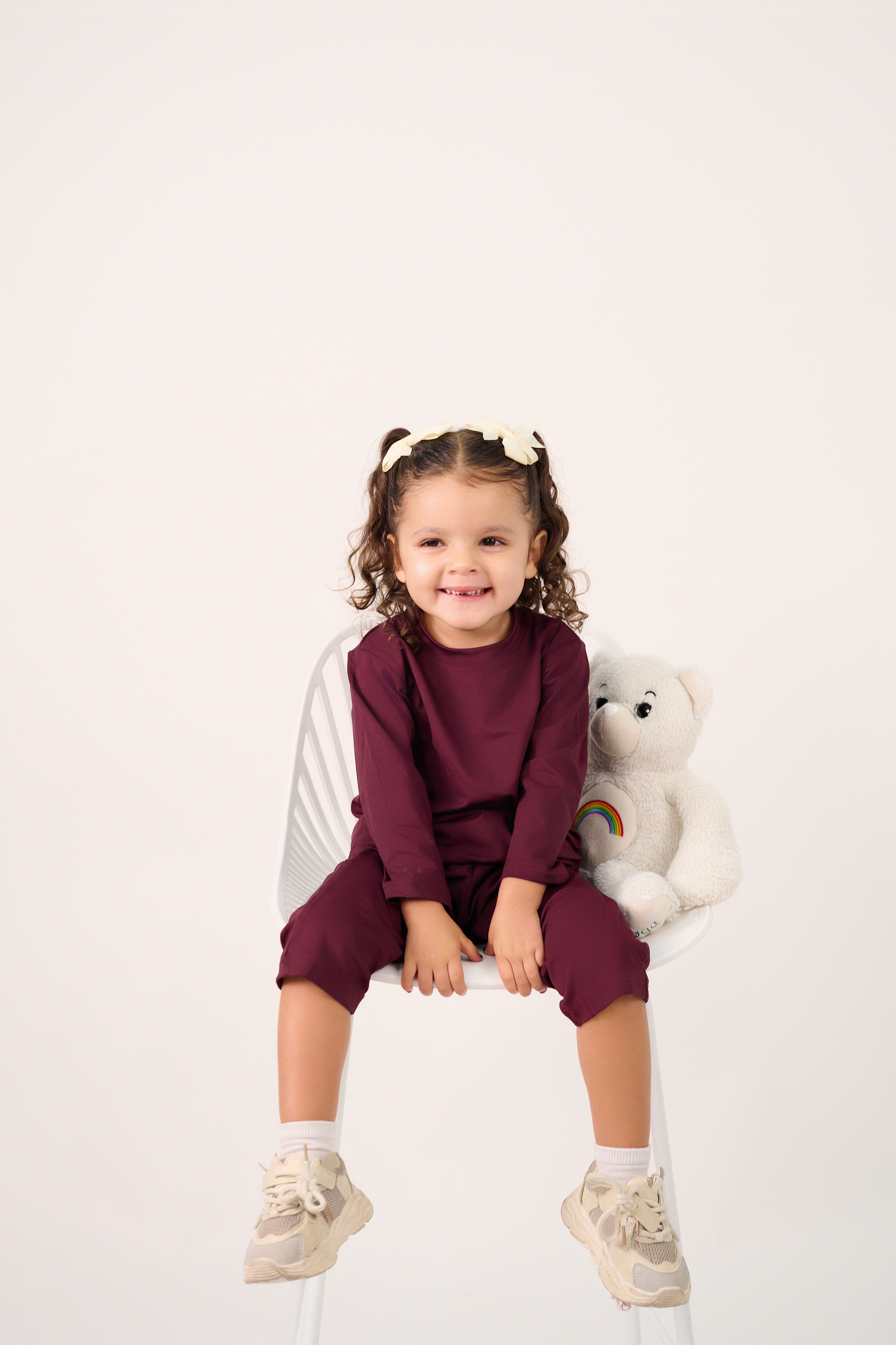 Friends laughing and posing inside a car