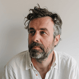 Middle-aged man portrait with natural light background