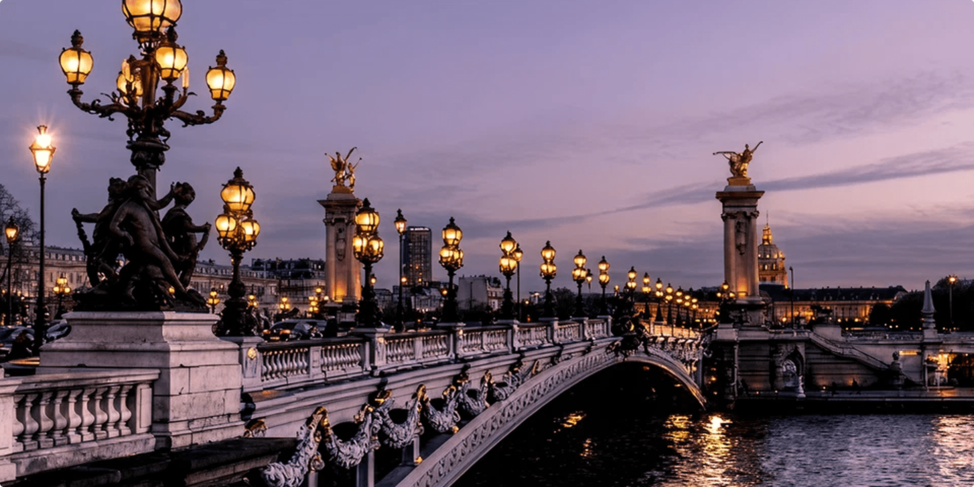 brown and white concrete building near green grass field during daytime