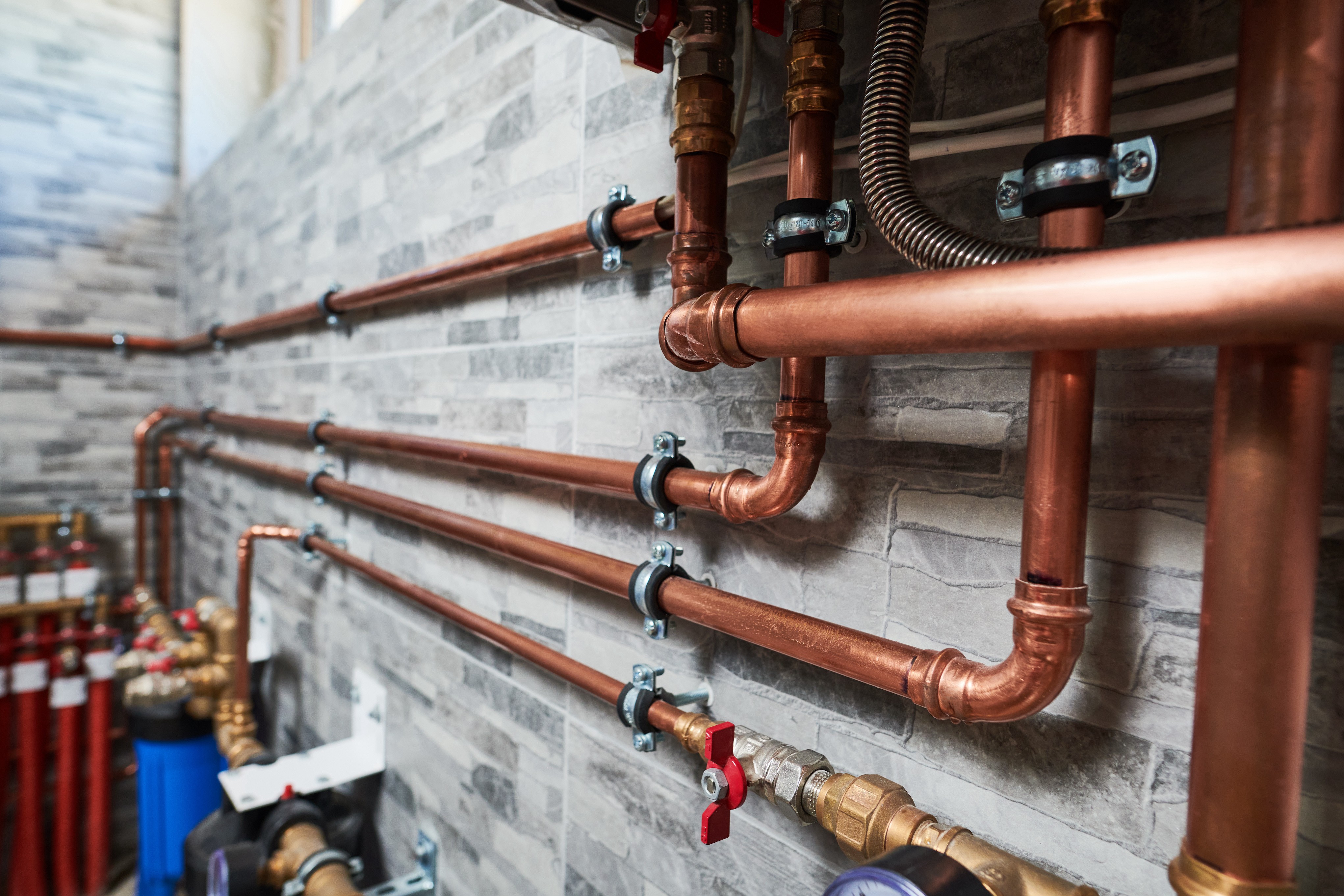 Photo of copper pipes and plumbing installation