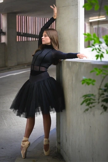 Ballerina against a wall