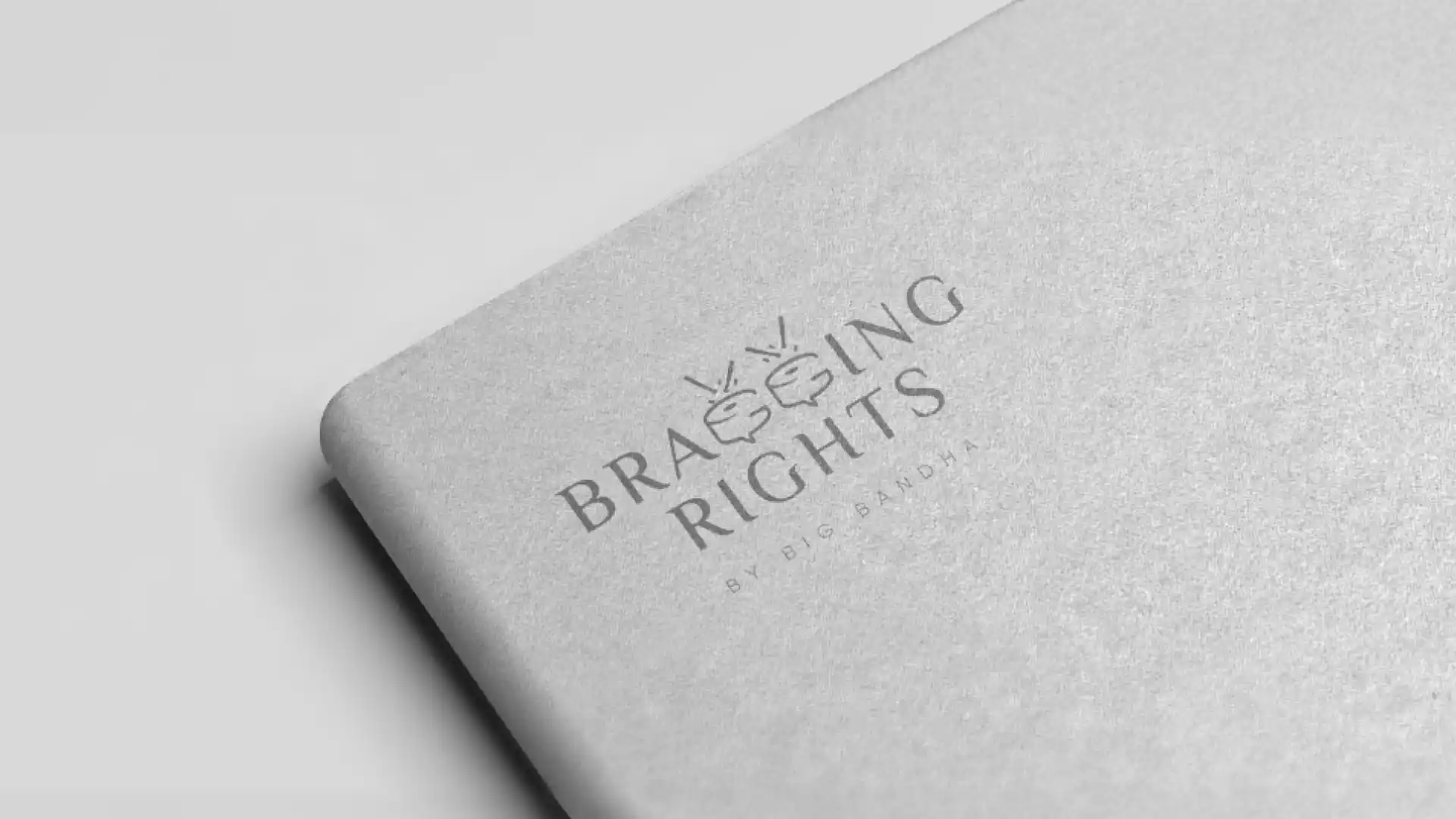 Bragging Rights logo debossed on a notebook