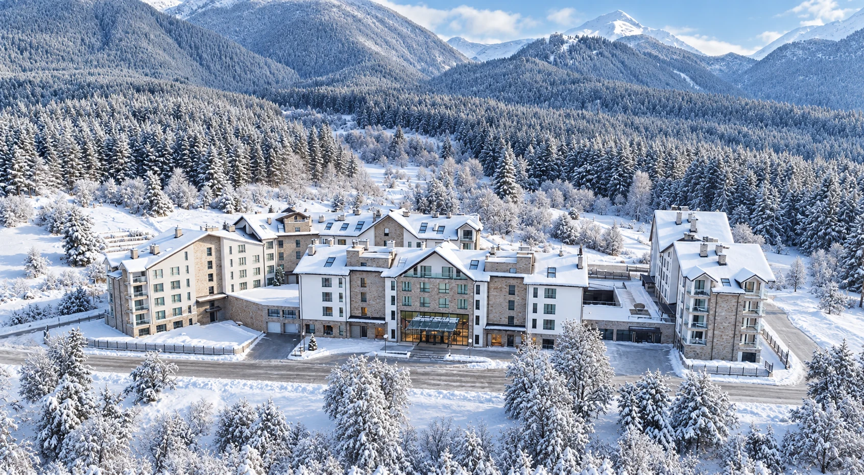Representative hotel exterior in a snowy mountain setting