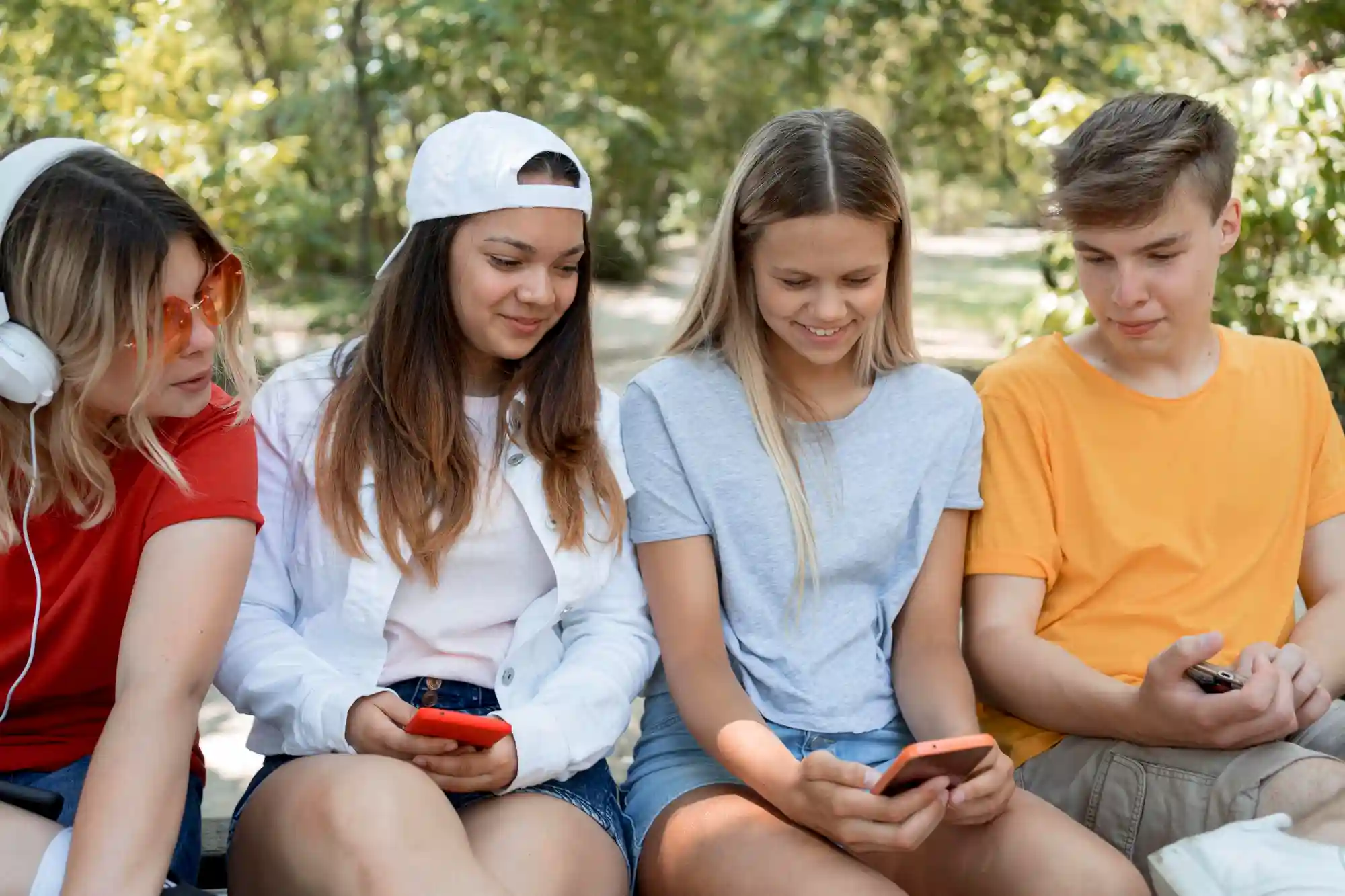 Gen Z users on their phones, representing a key demographic driving the "impulse engine" of TikTok Shop in Germany.