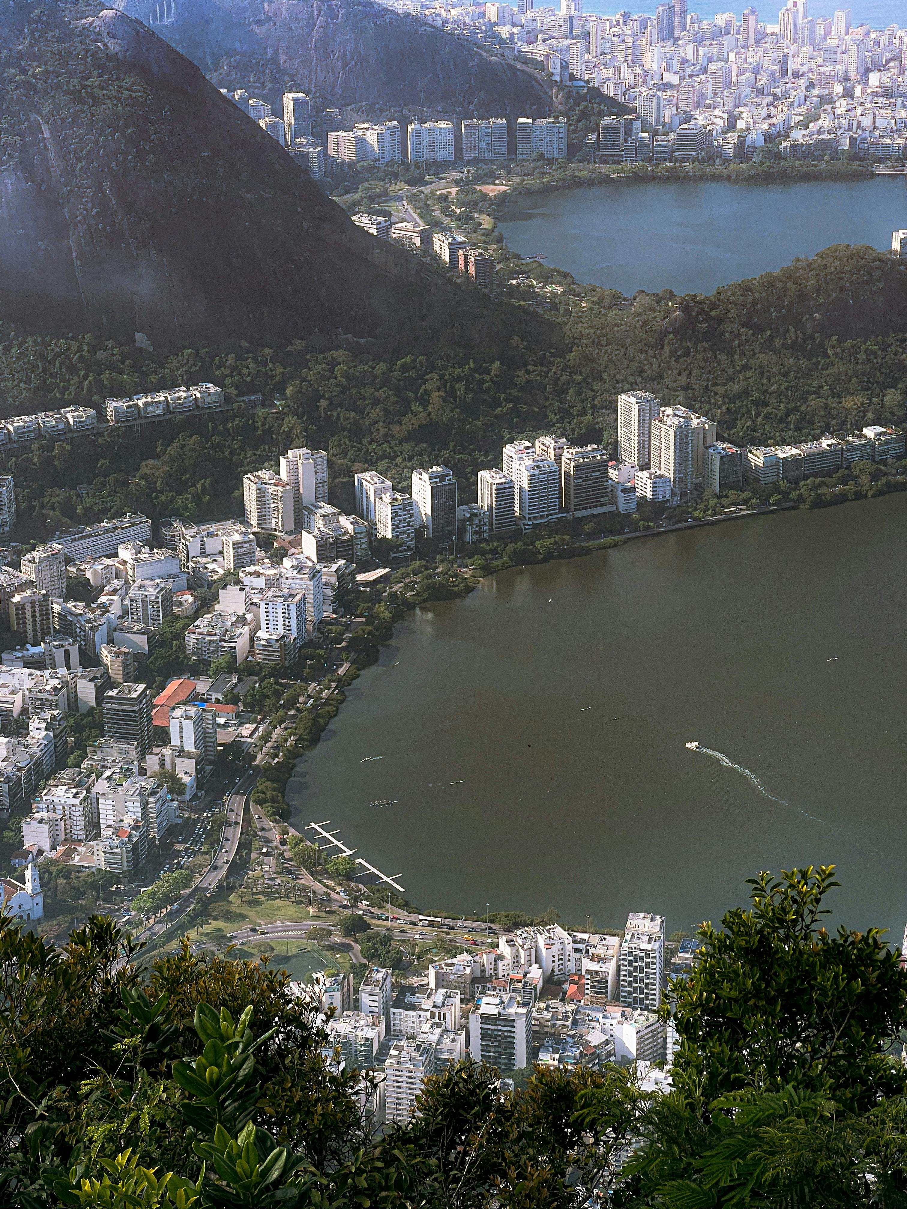 aerial view of village on mountain cliff during orange sunset