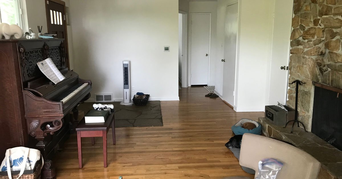 Before Photo of the entryway in the Sandpoint Home in this Seattle, Washington home by Sherri Monte, interior designer at, Elegant Simplicity.
