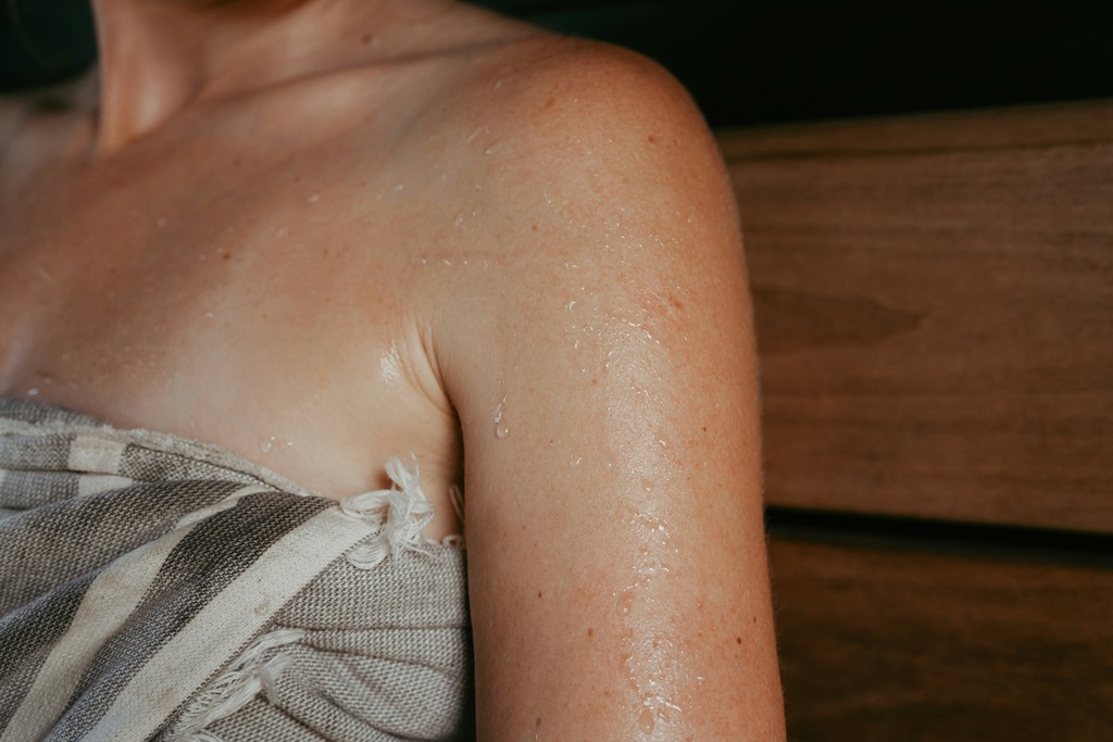 Therapist using cupping tool on back
