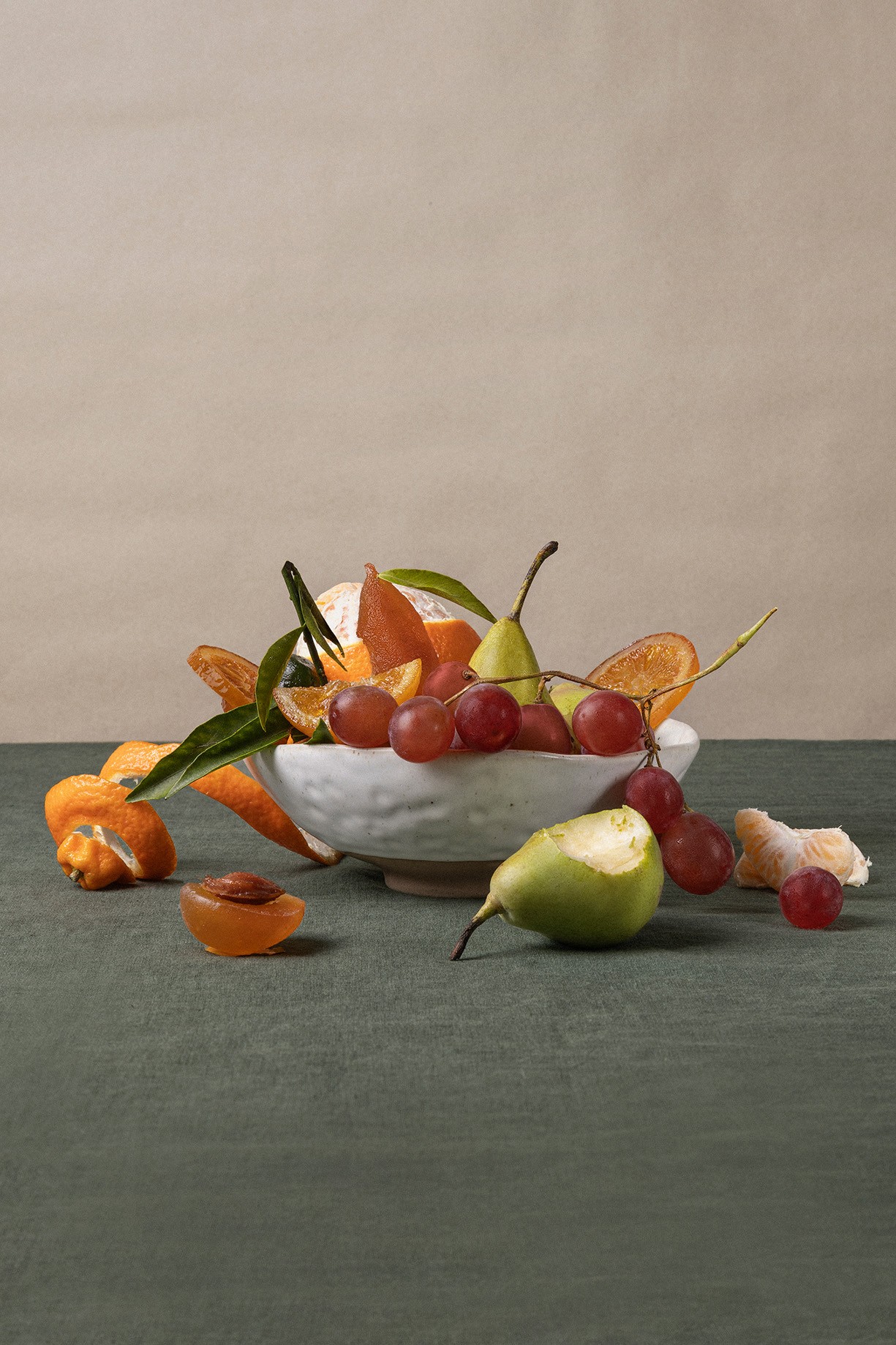 a penguin standing on a rock in the water