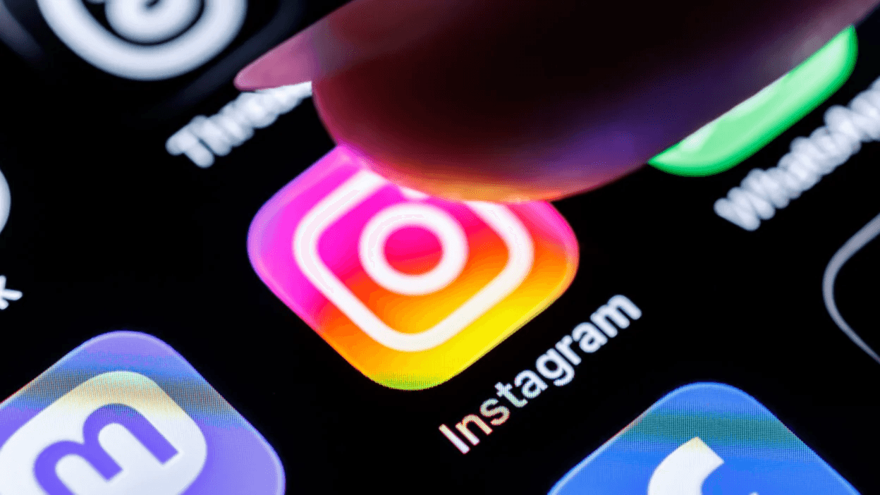 Person clicking on Instagram app -  Faceless Instagram Content Ideas