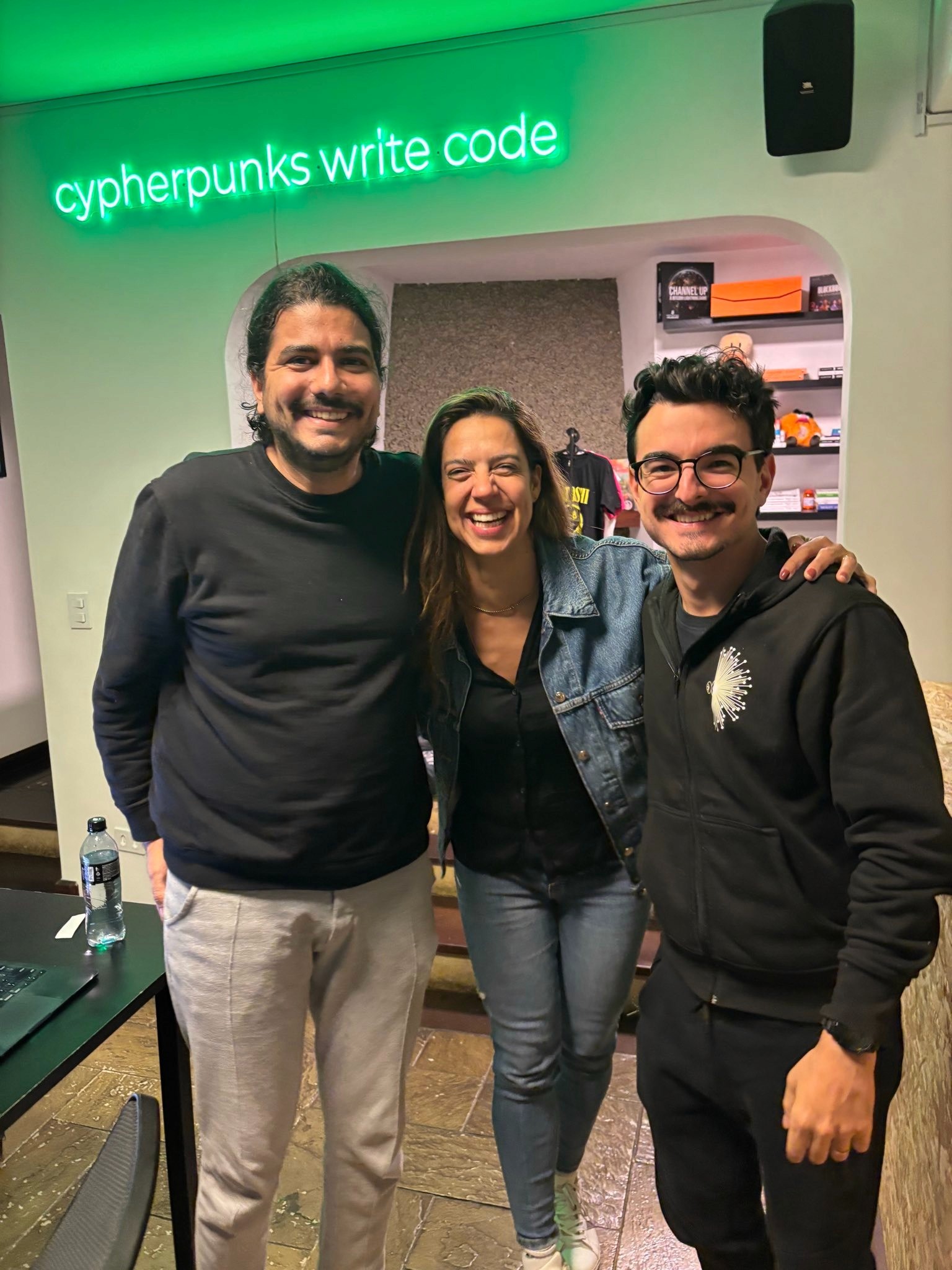 Lucas Ferreira, Fedi's Head of Field Operations Renata Rodrigues, and Bruno Garcia at Casa21, Vinteum's Bitcoin community space in São Paulo