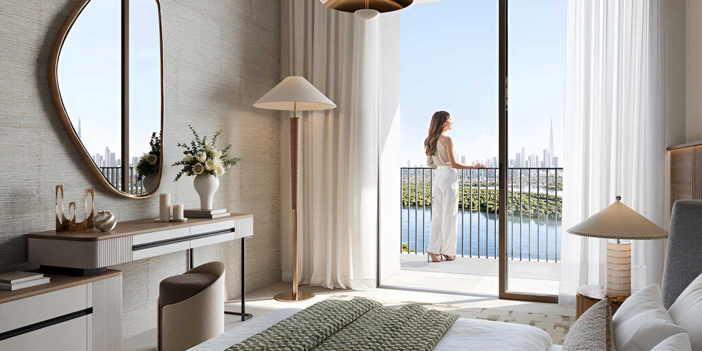 The living room at Creek Haven presents a chic interior with a breathtaking view of the city skyline beyond.