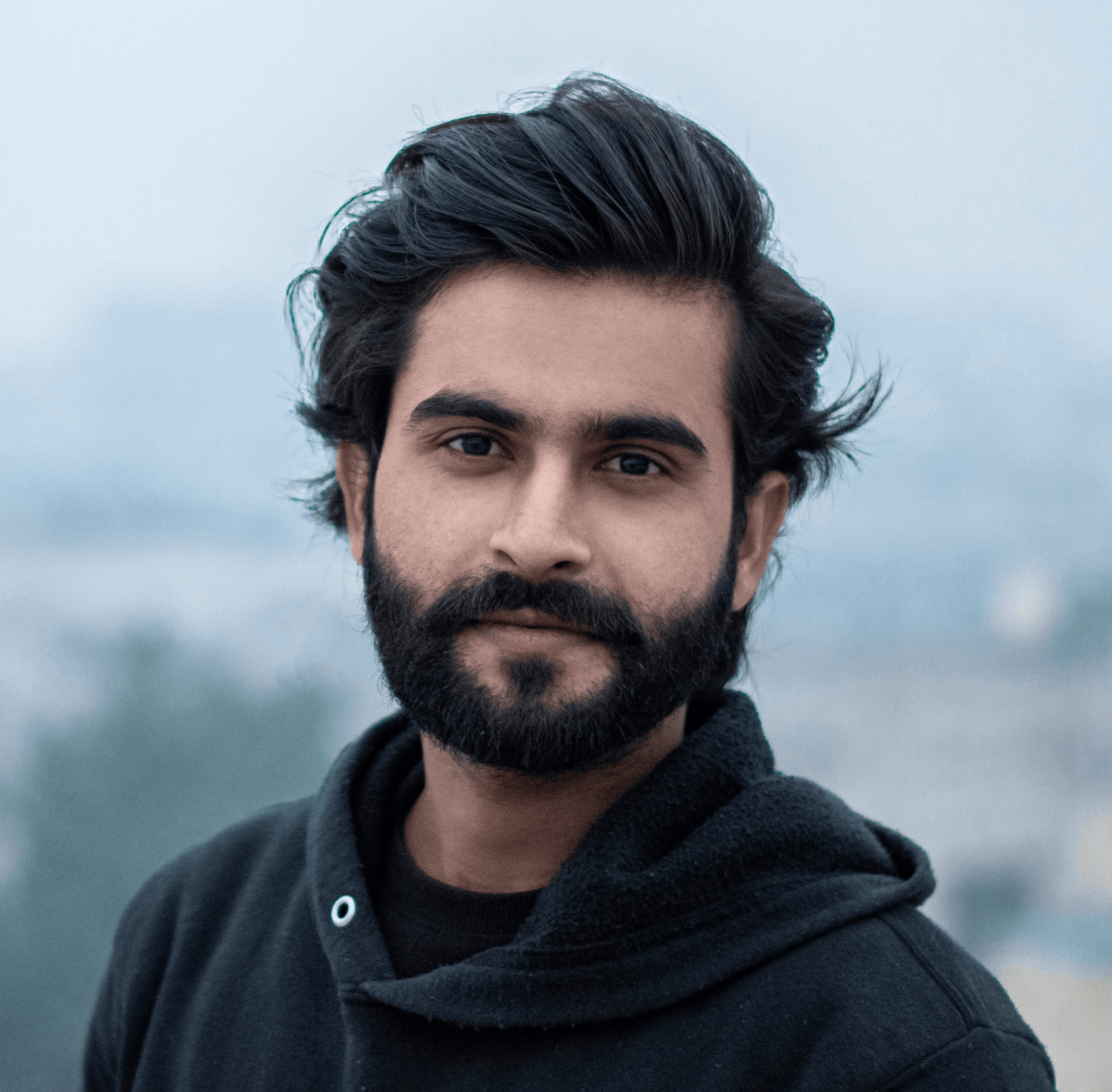 man in black zip up jacket