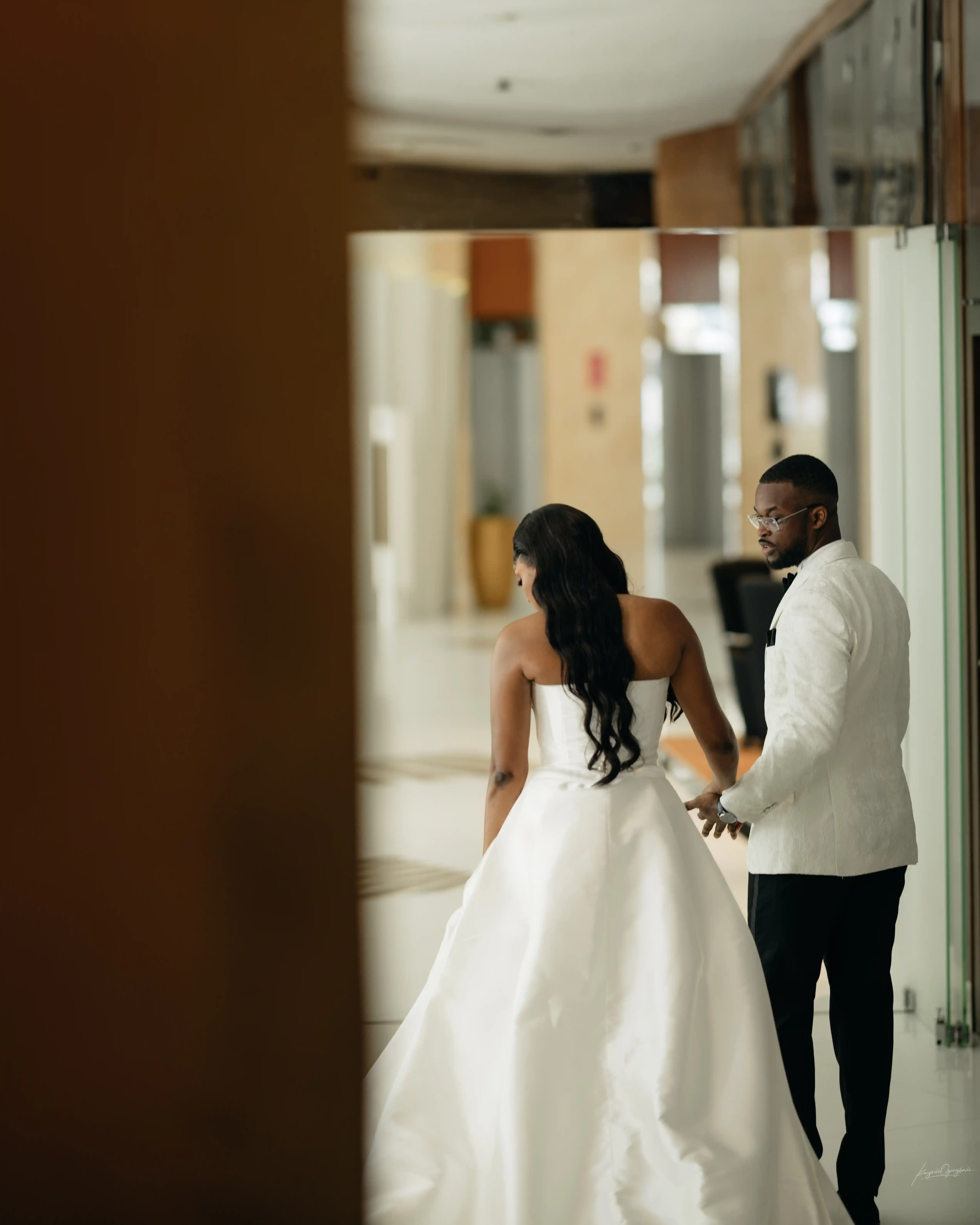 Bride and groom celebrating a luxury wedding coordinated by Victoria Brooks Events, a premium wedding planner in Nigeria.