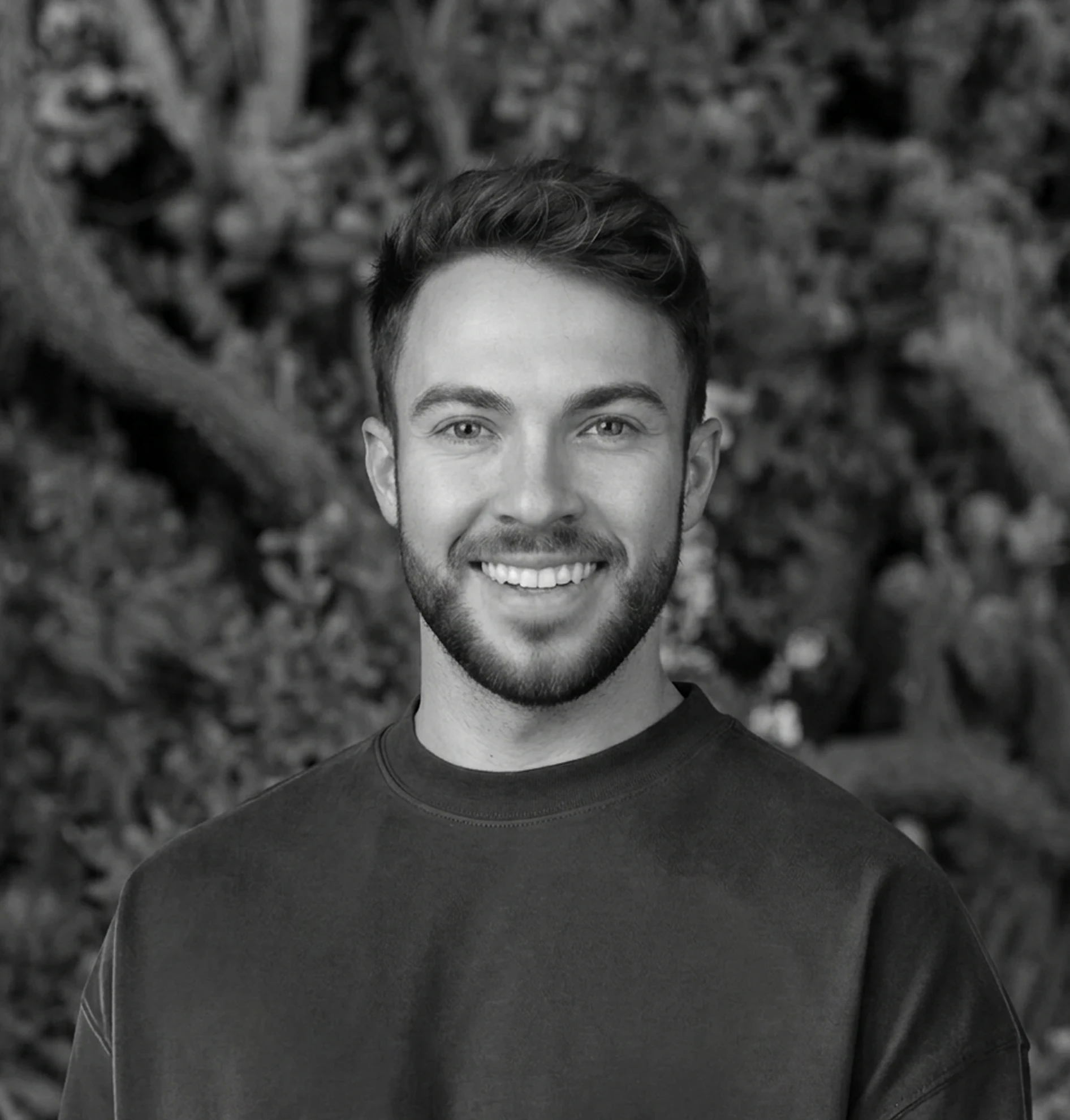 My Story: A portrait of a Yanick Jimenez (product designer) smiling with short brown hair and a light beard, set against a soft green background. The text below mentions that he is originally from Costa Rica and now lives in Quebec, Canada.