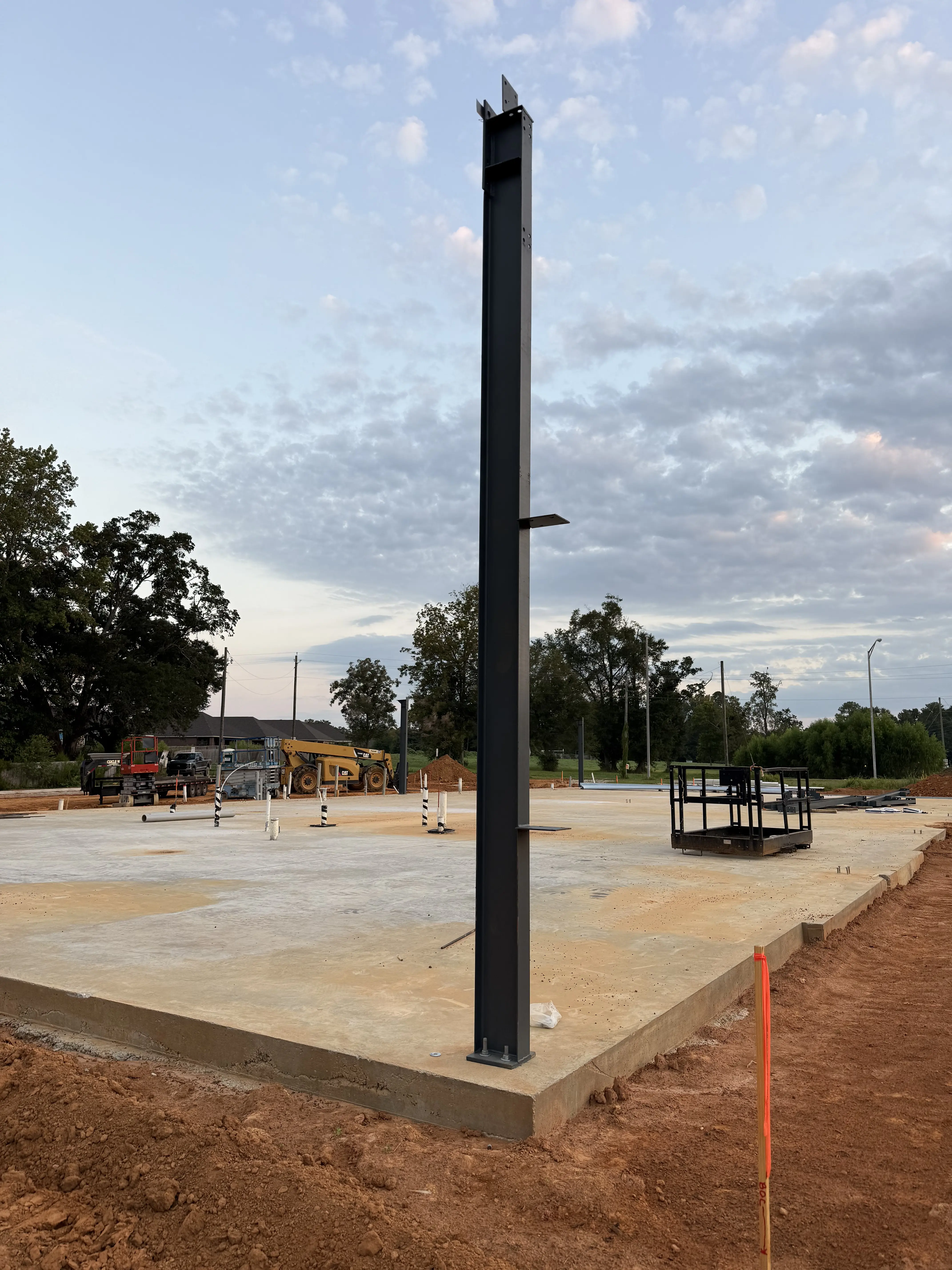 man standing infront of miter saw