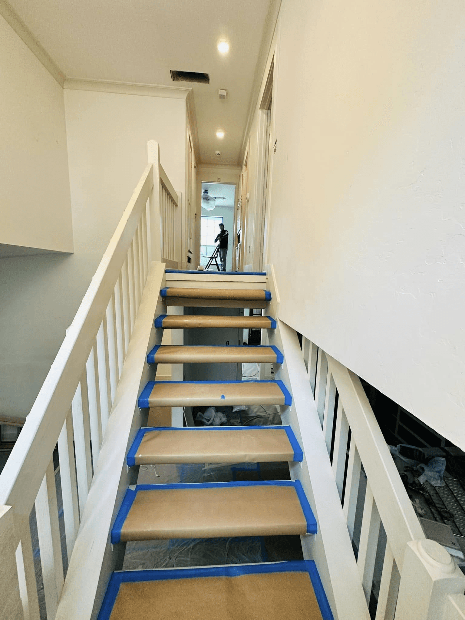 Second-story home addition under construction in Dallas featuring stairway framing, interior layout expansion, and structural remodeling work.