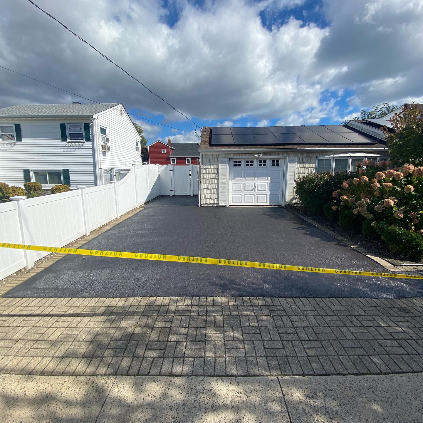 Completed driveway paving project by Rockville Concrete Corp on Long Island