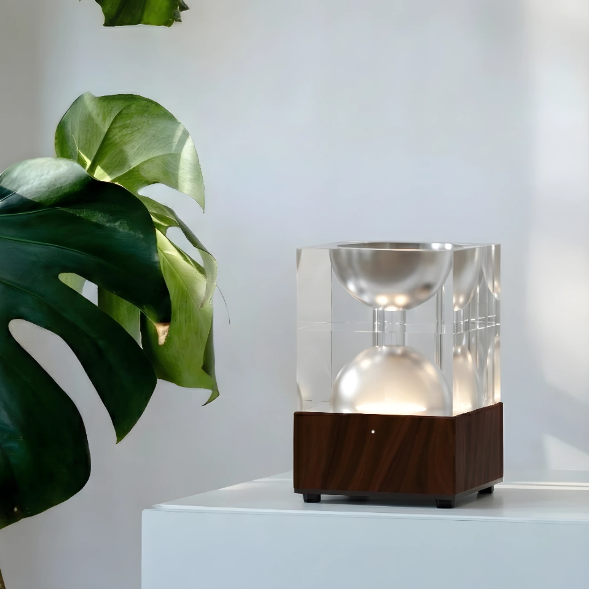 a black headphone on a wooden surface