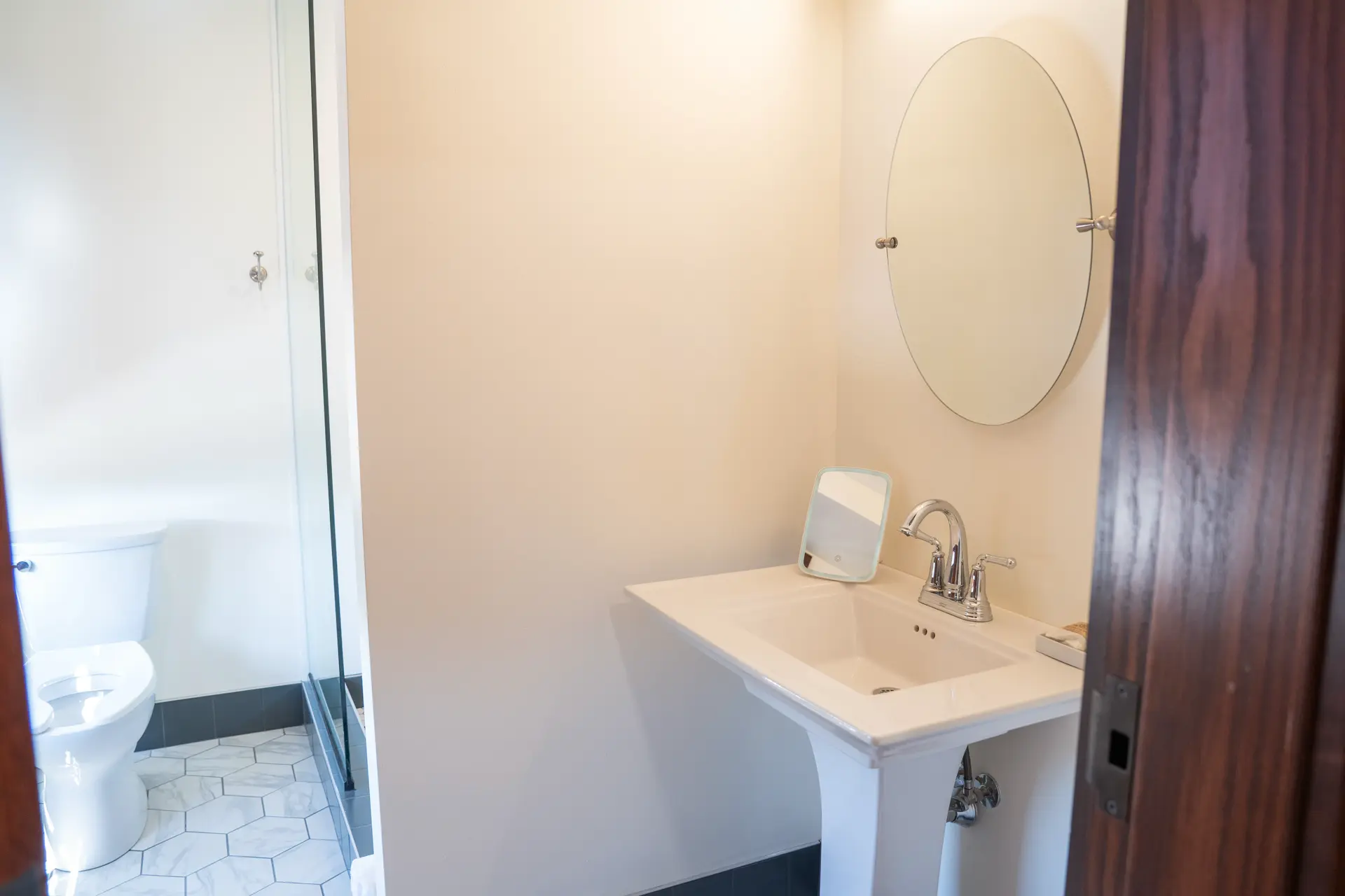Bathroom with walk-in shower and sink