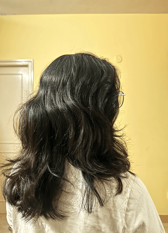 Black and white portrait of a woman with a blurred background