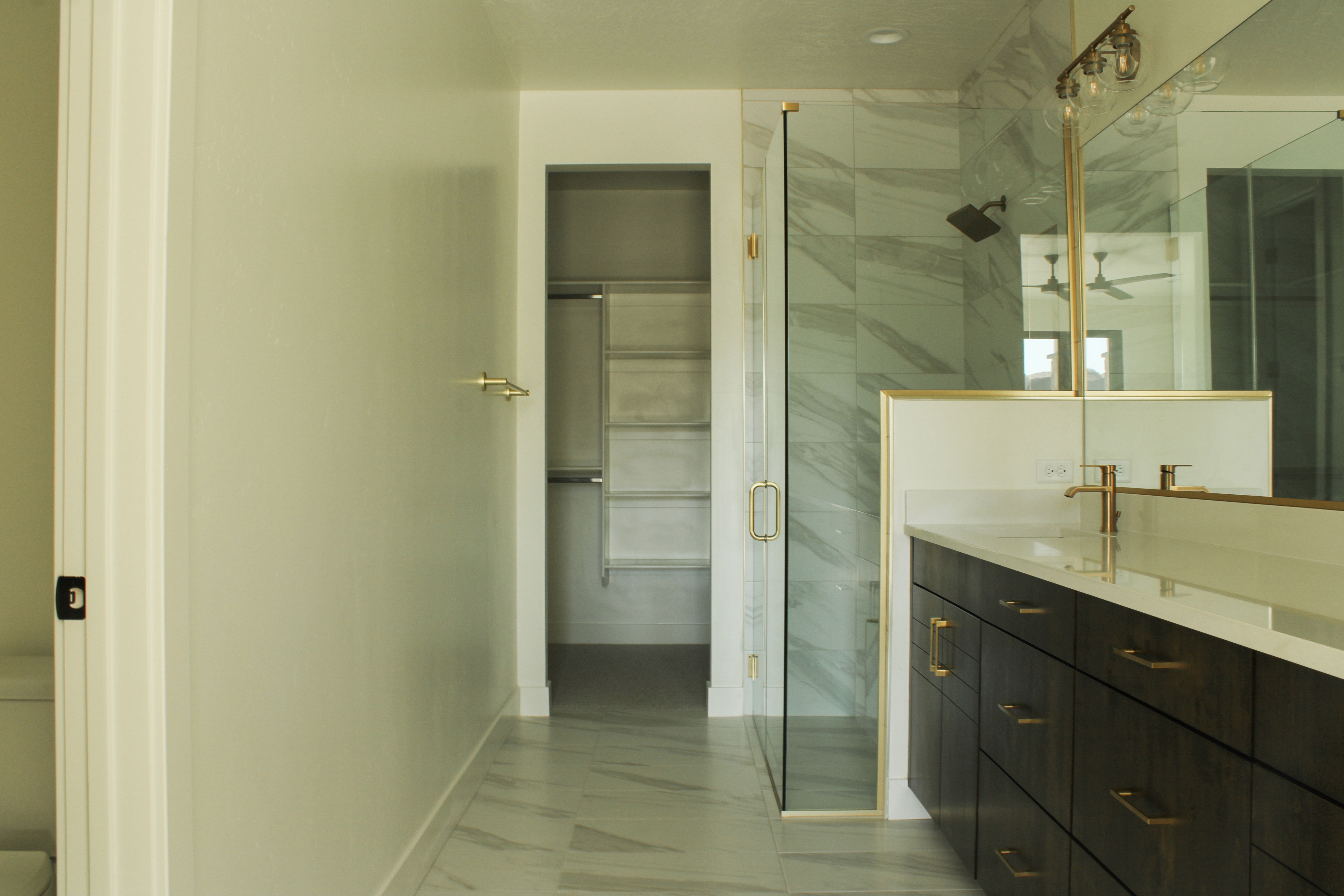 Primary bathroom at The Overlook at Falcon Ridge in Hurricane, Utah, with custom cabinetry.