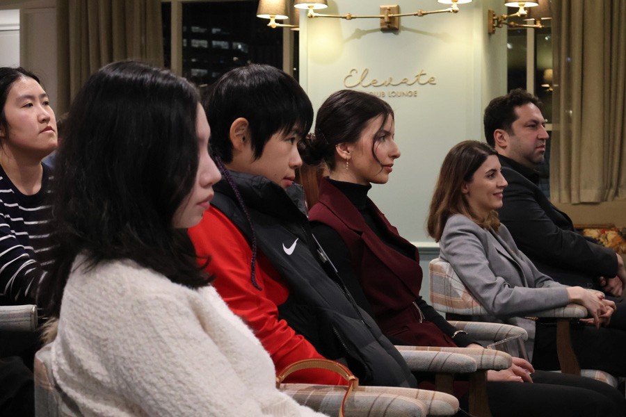 audience members sitting in their seats