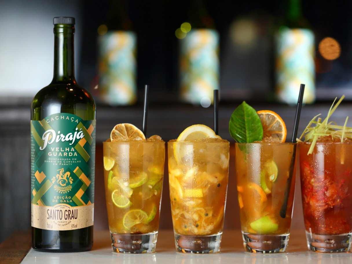 Rooftops of a coastal town with the sea in background