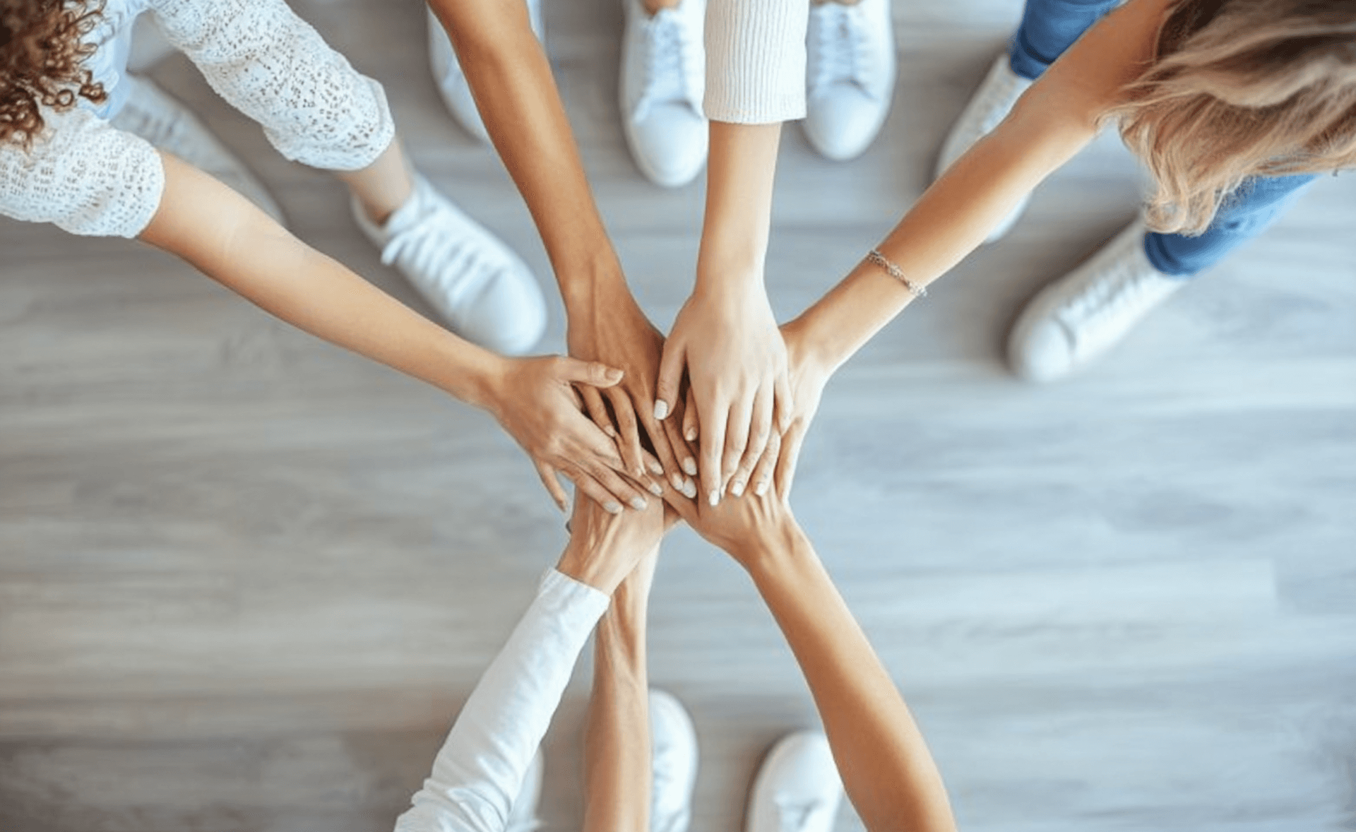 Photo of hands illustrating the concept of Team Building