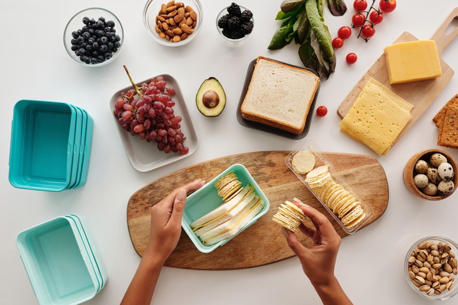 Pre-portioned healthy snack in a container, representing a planned snack.