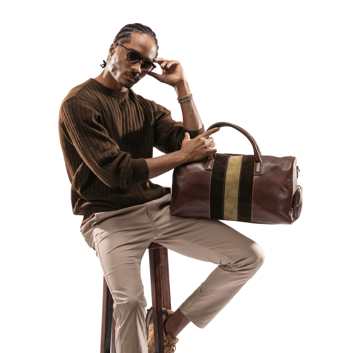 Man sitting with a brown leather bag on a white background