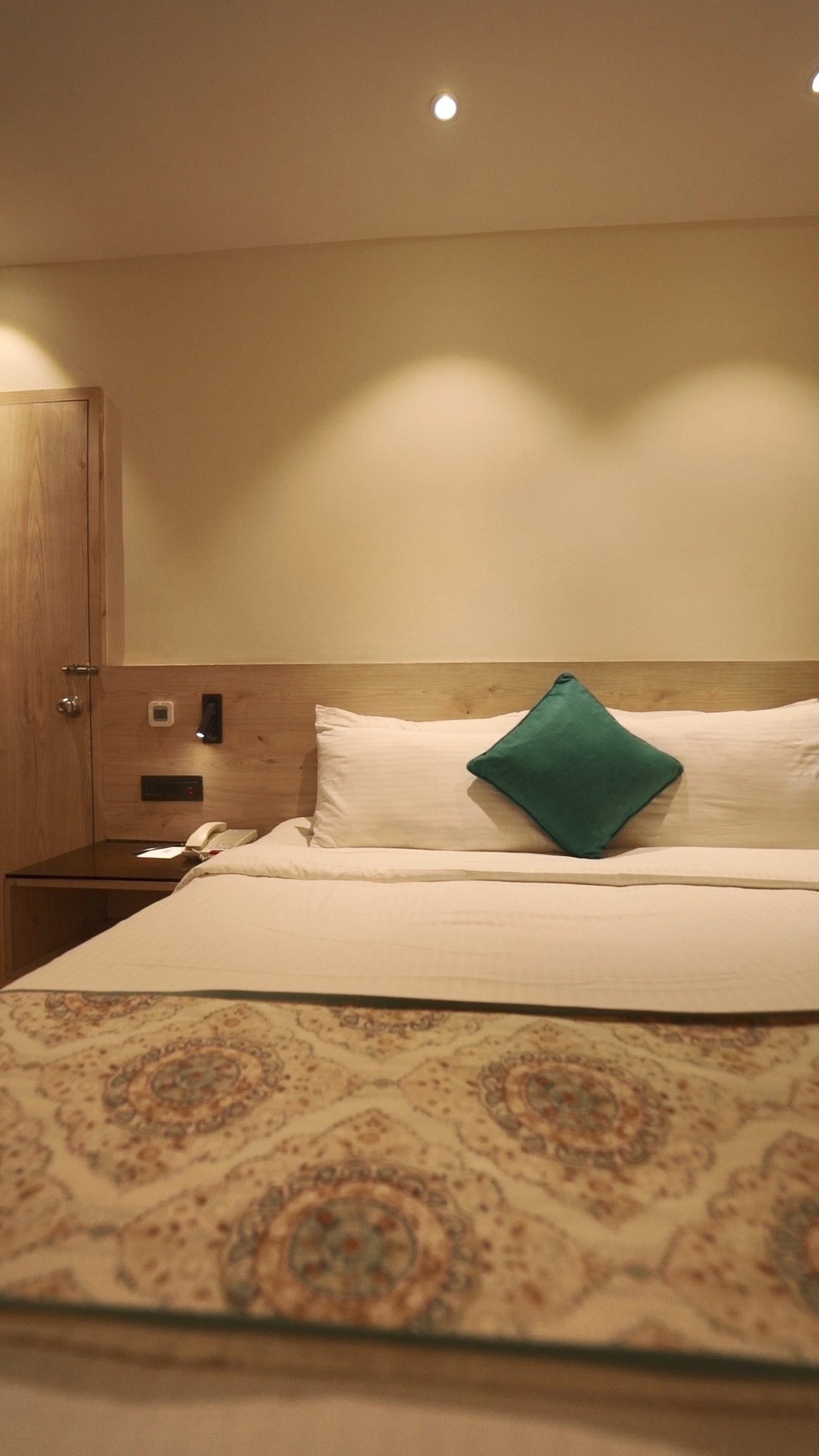 white bed linen on bed
