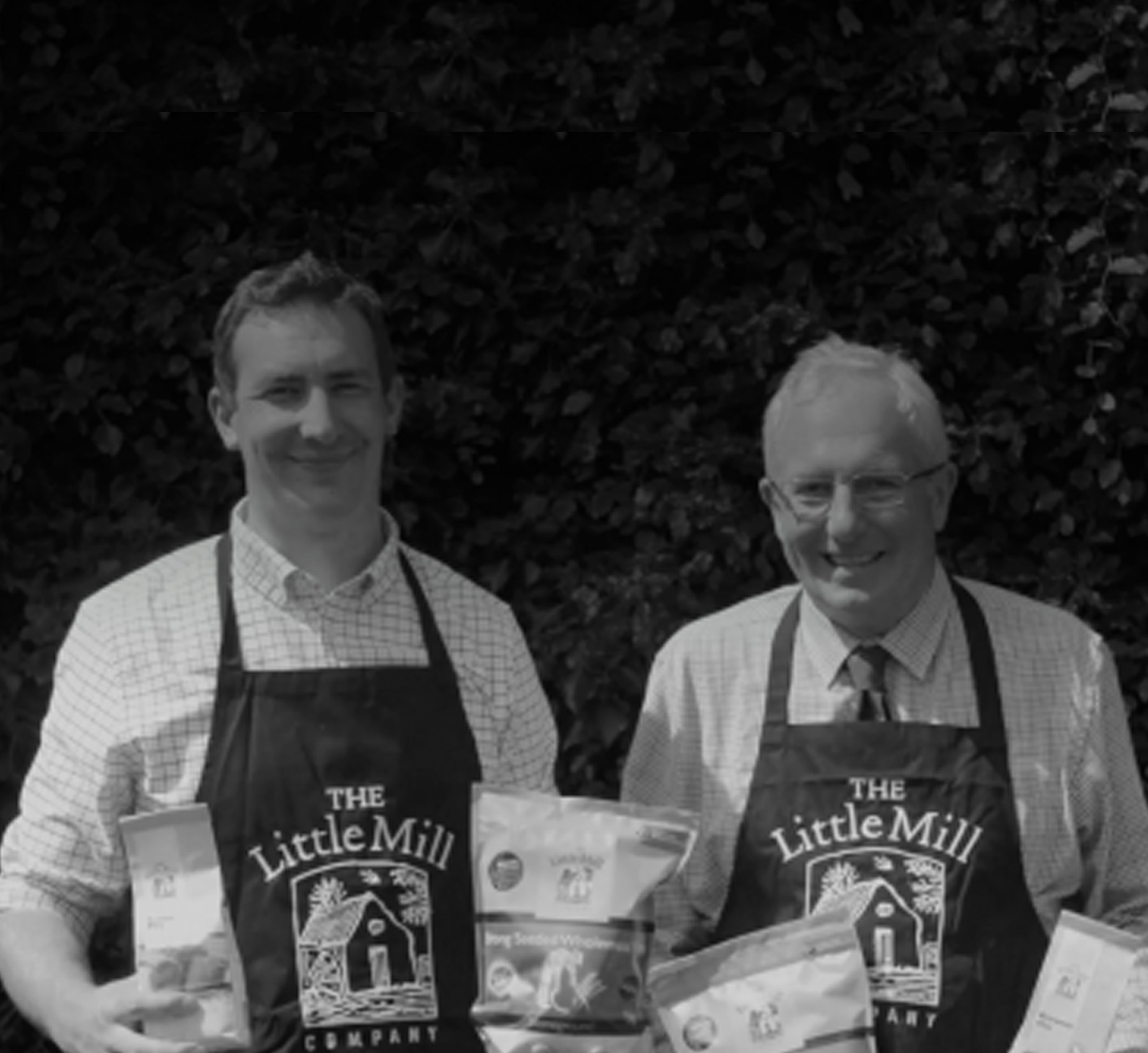 Owners of The Little Mill laughing and standing besides eachother while supplying their goods to As One Restaurant Dubliln