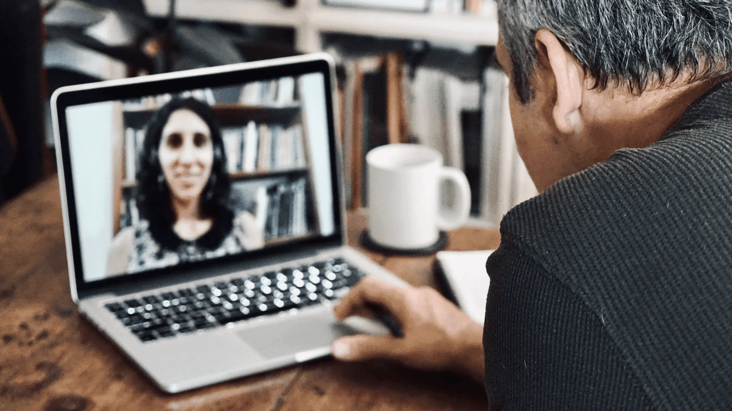 Man attending online classes on laptop -  Online Spanish Courses for Adults