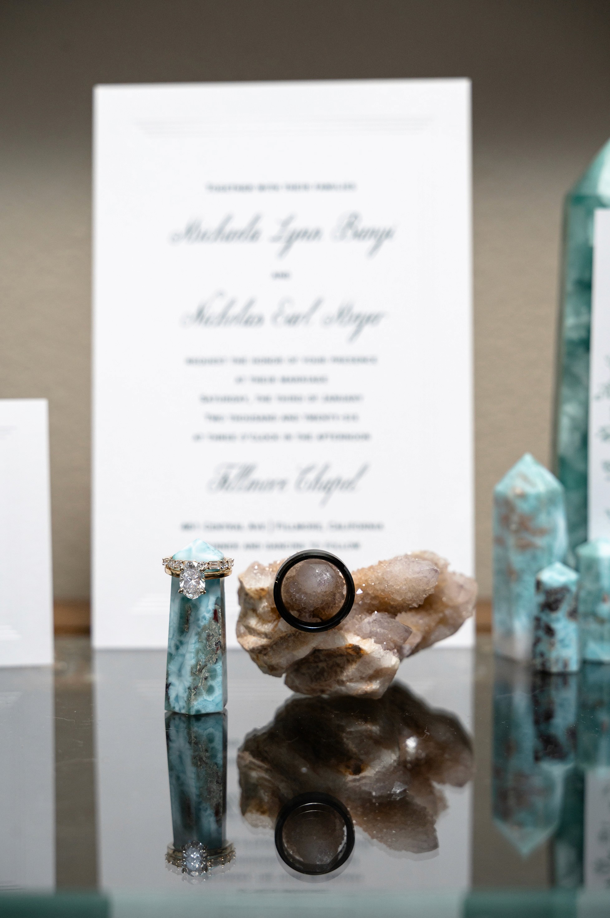 Flat lay wedding details with bouquet, rings, and sparkling bridal heels