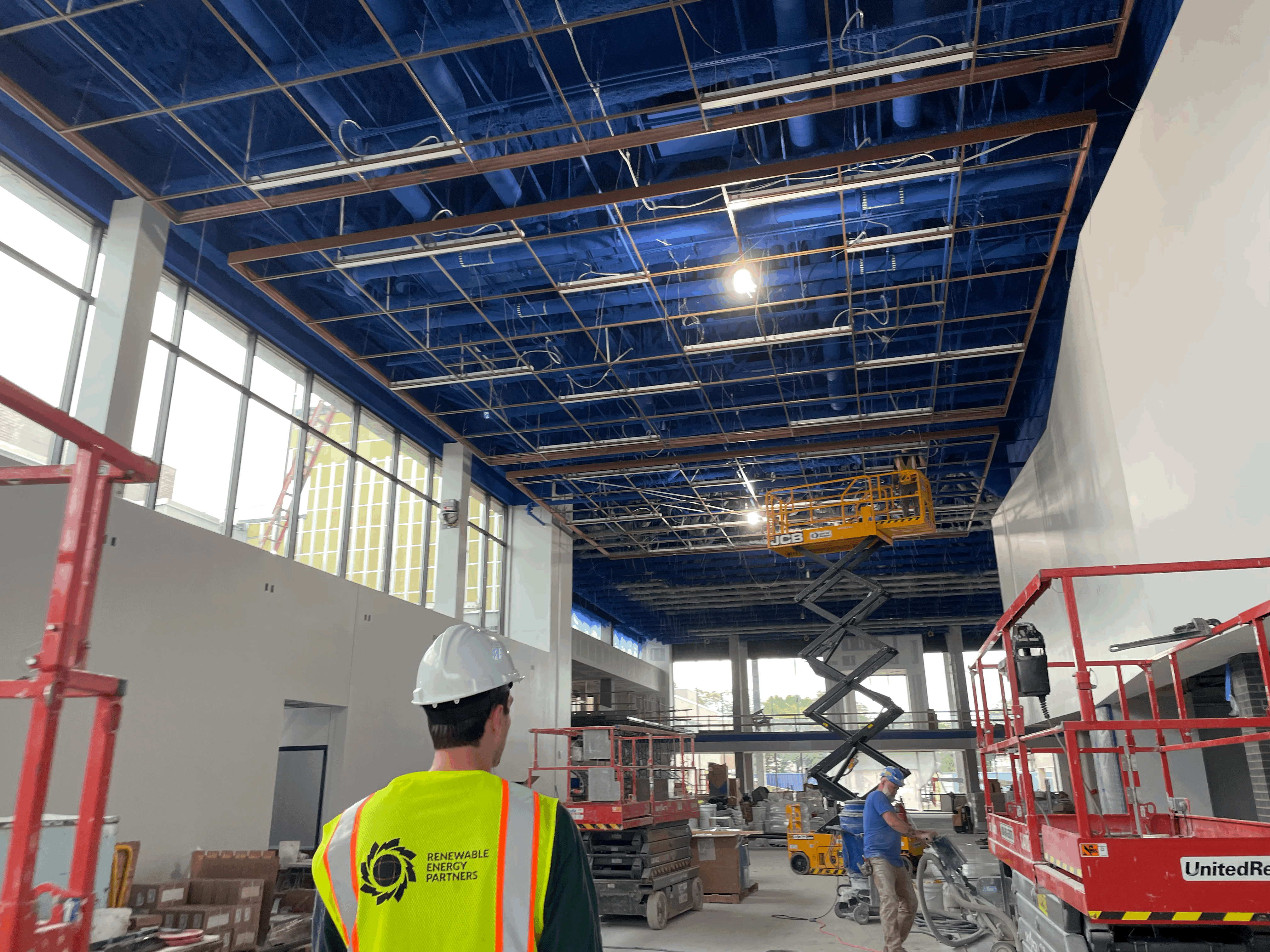 Worker installing solar panels