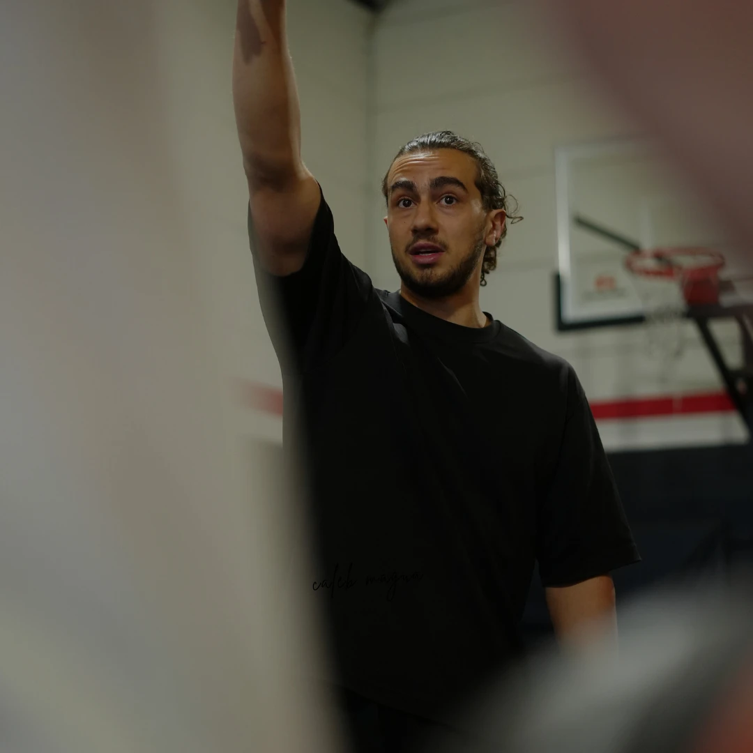 Free Flow Basketball Coach Caleb teaching the perfect wrisr flick