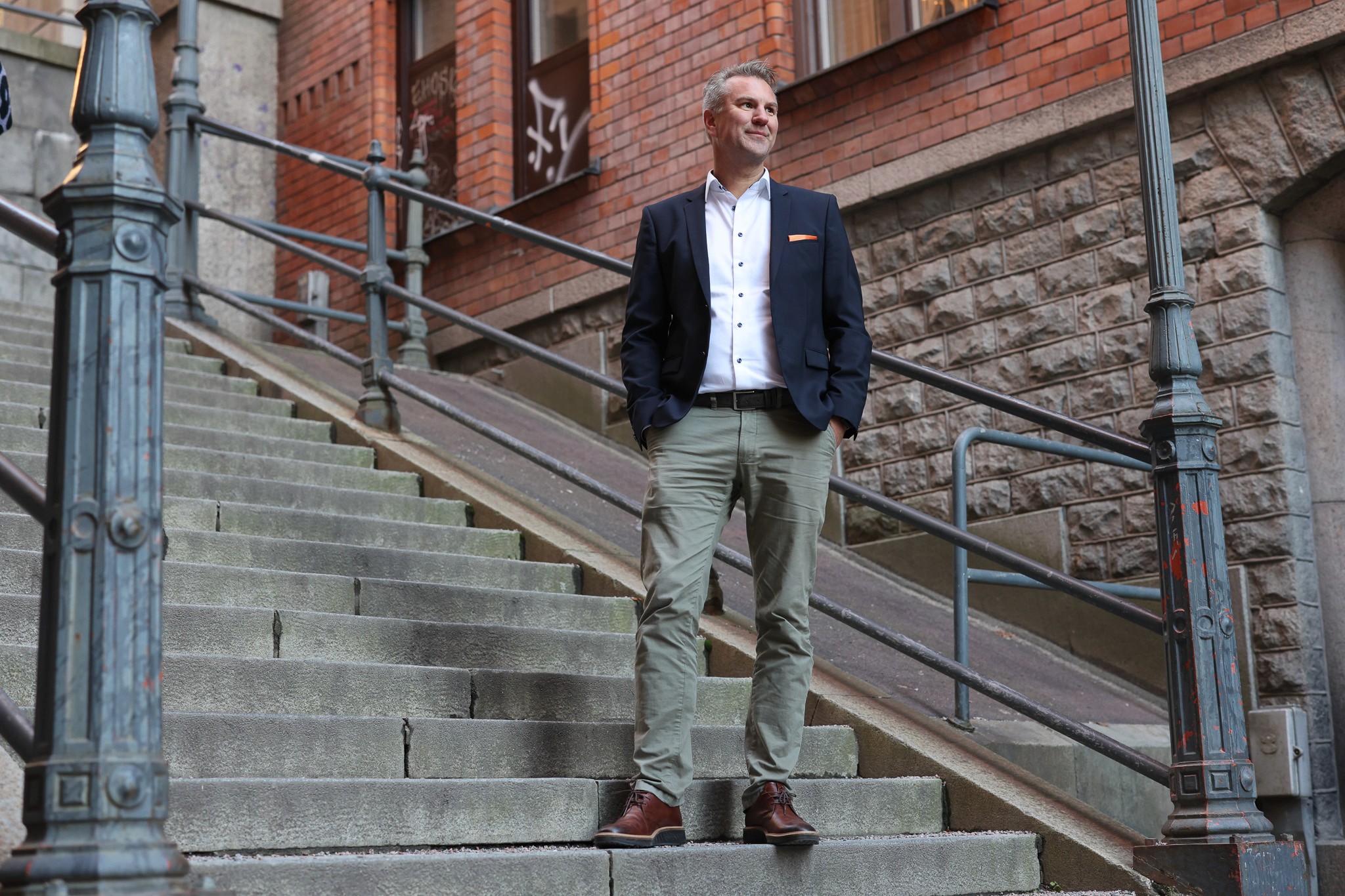 The team working together at a table with laptops, discussing business strategies or projects.