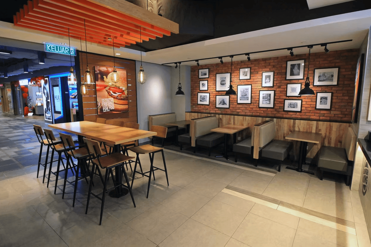 a living room with two recliners and a sink